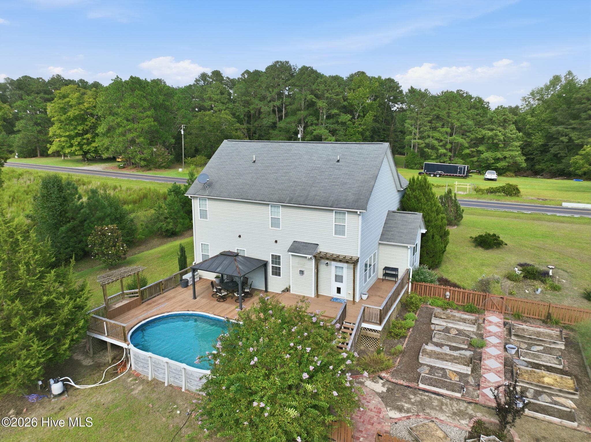 Backyard View with Garden - 1284 L Cooper Road, Cameron, NC 28326