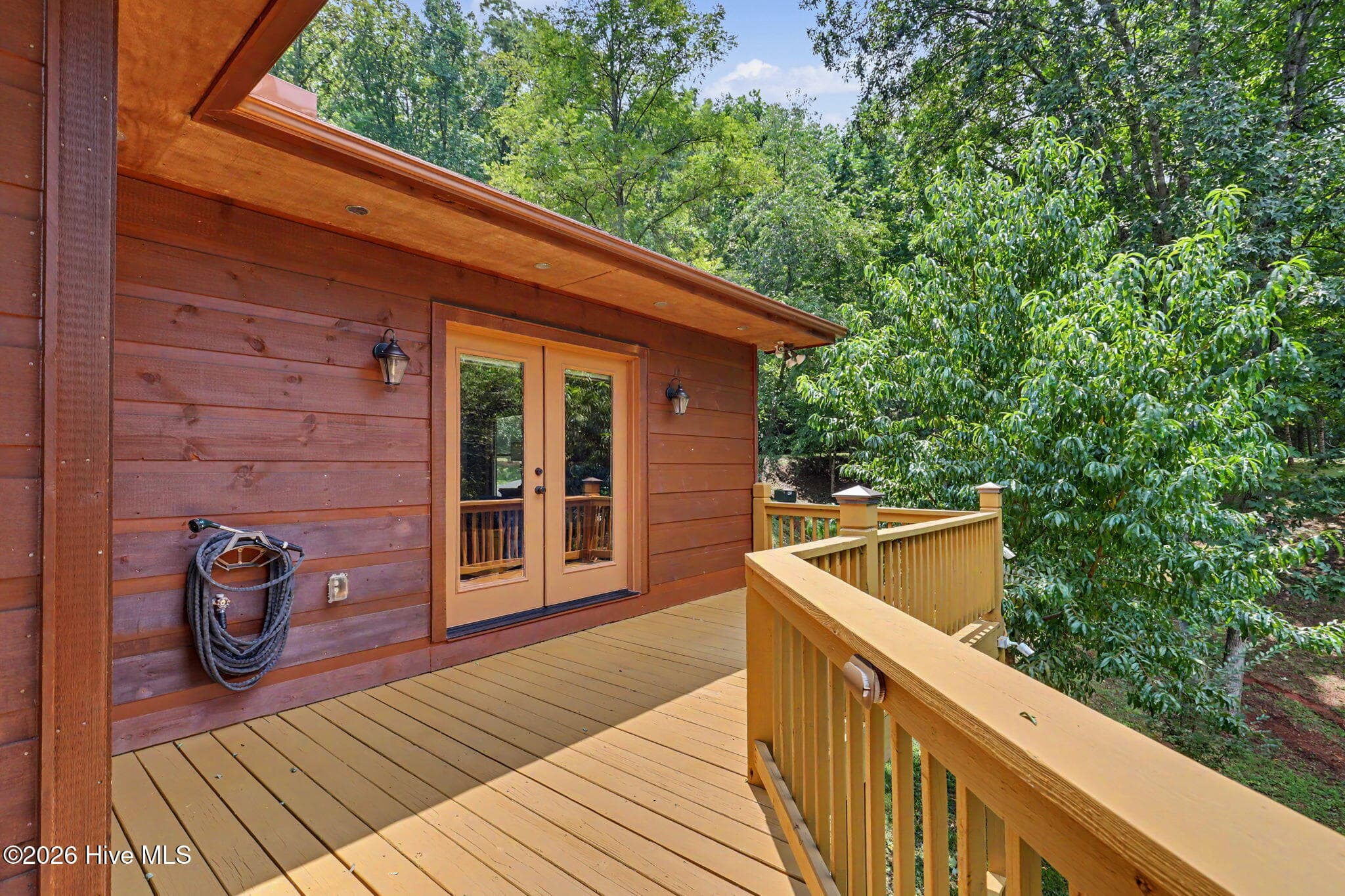 Multiple deck areas provide plenty of room to relax or entertain. - 210 Majestic Drive, Hayesville, NC 28904