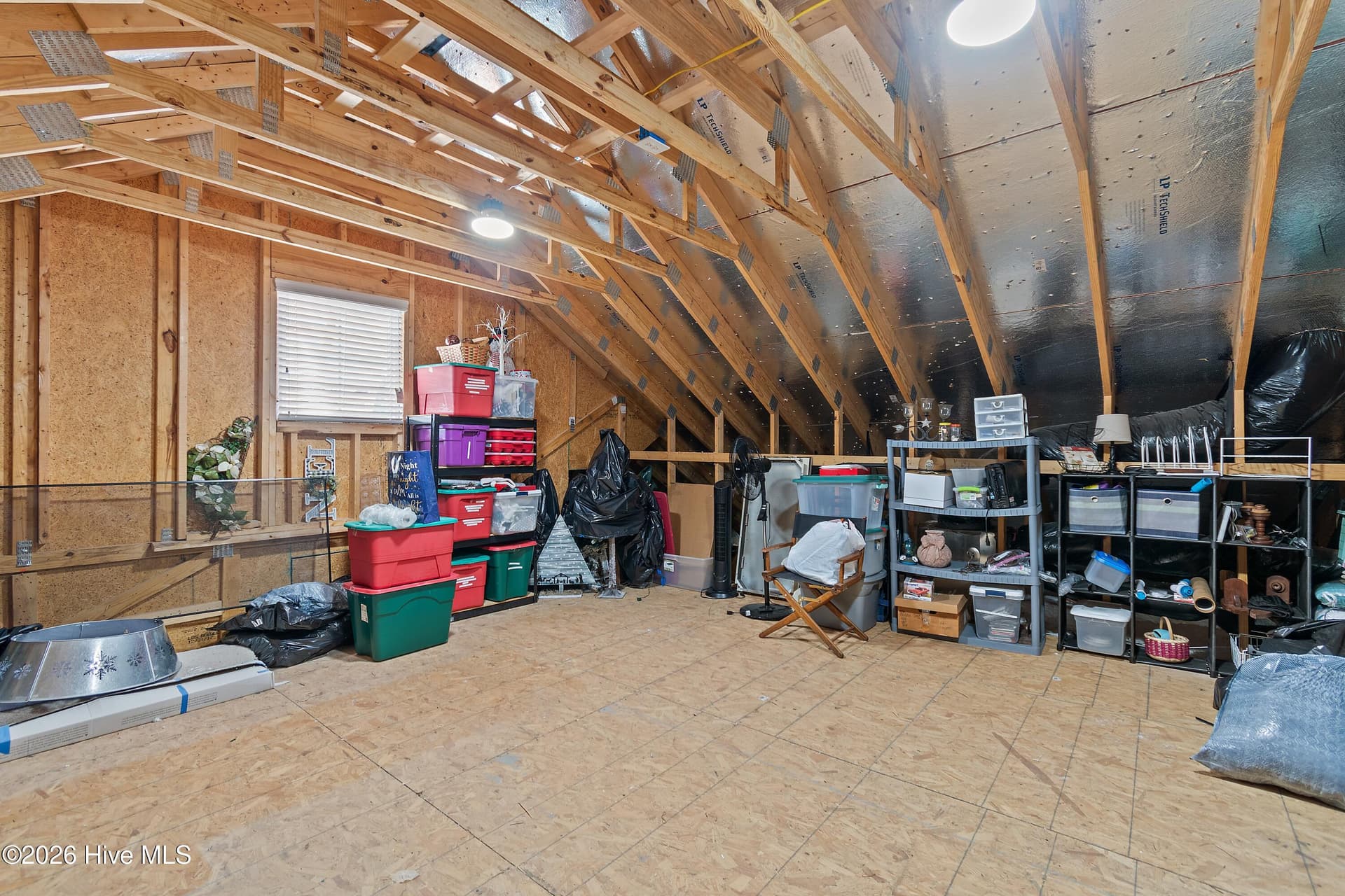 Second floor of home- this is a walk-in storage room. This room has tons of potential! - 6358 Bryson Drive SW, Ocean Isle Beach, NC 28469