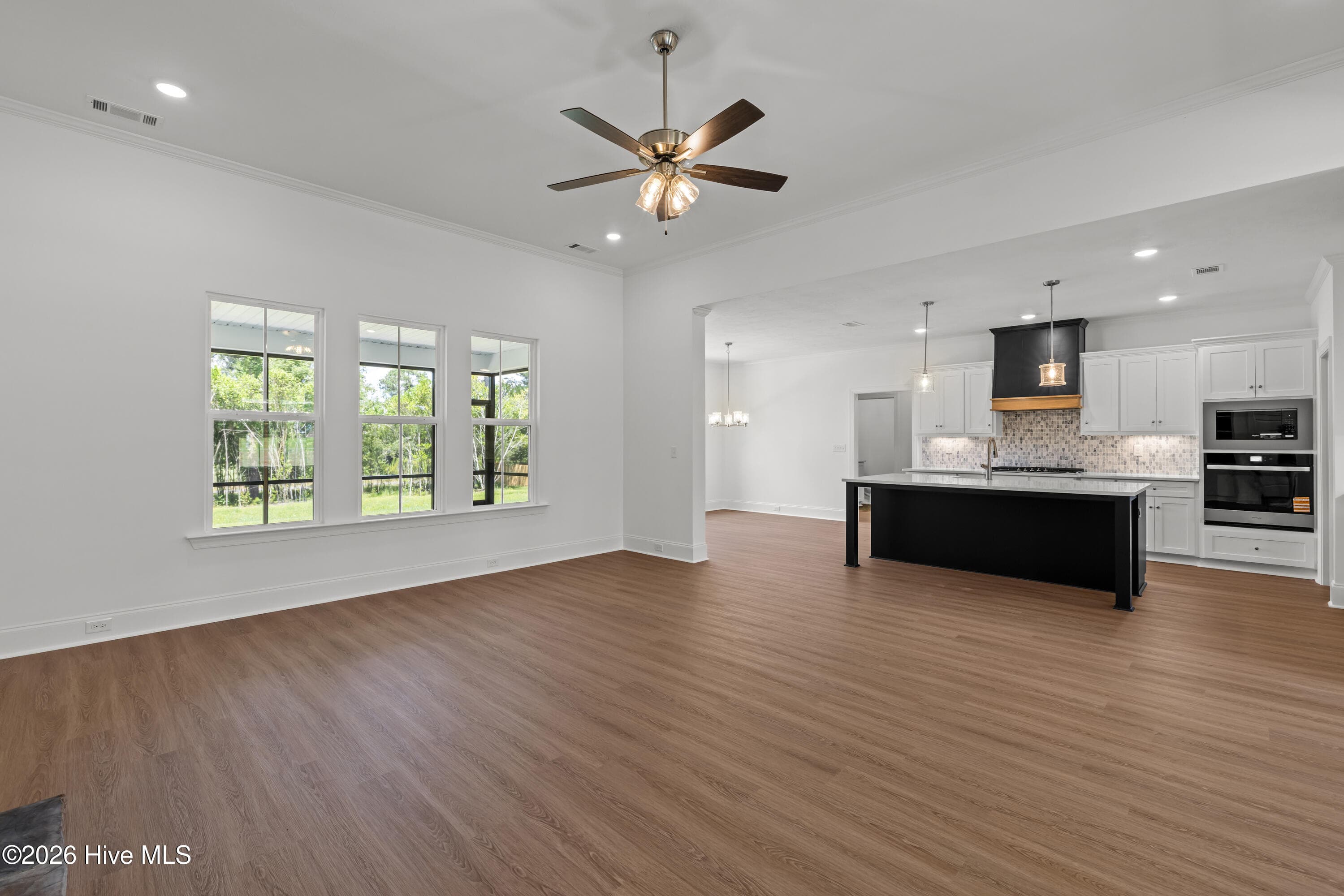 Durable LVP flooring in the main living areas - 1550 Bellingham Drive, Beech Island, SC 29842