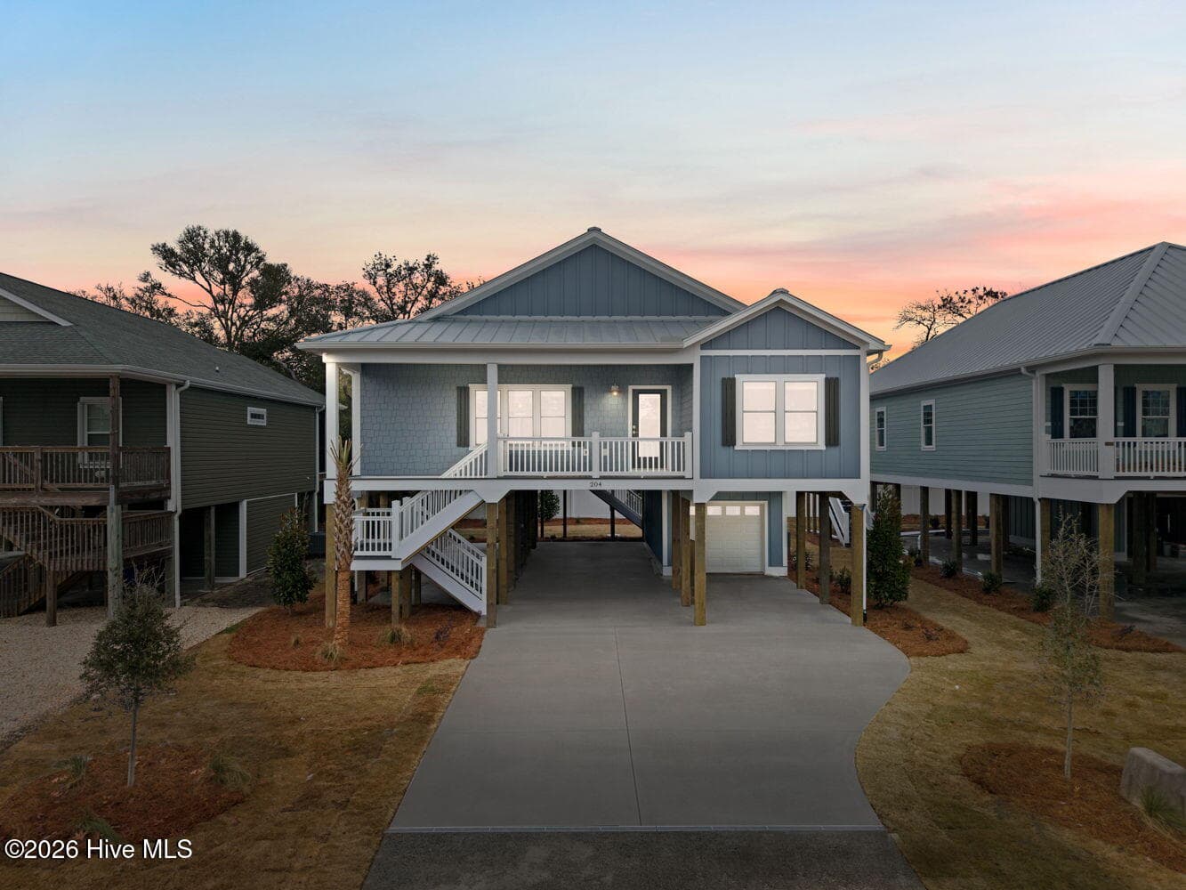Photo is for illustrative purposes only of a similar home of same plan - 310 NE 58th Street, Oak Island, NC 28465