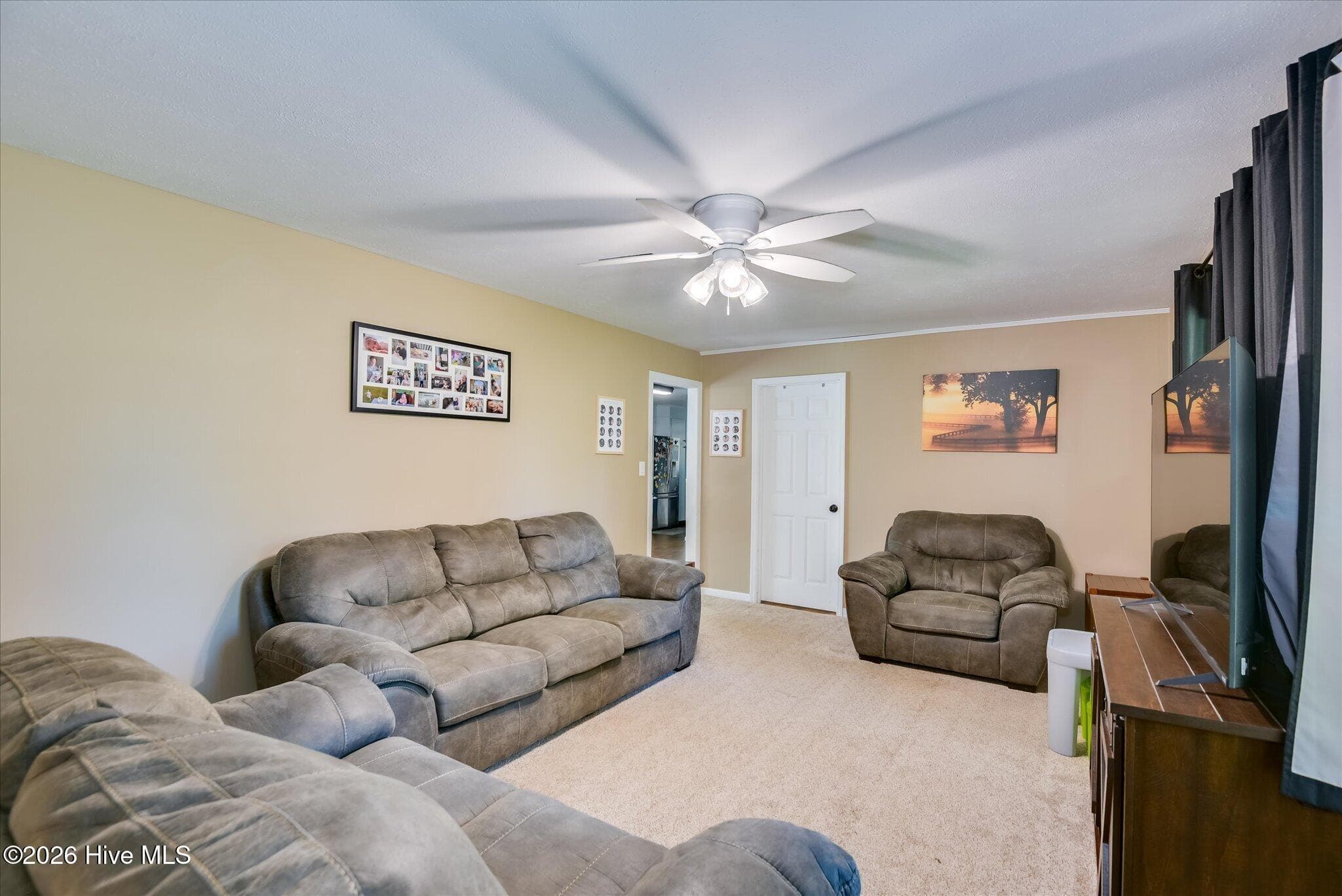 Area rug in photo can be removed to reveal original hardwood floors throughout the home! - 1445 Pine Log Road, Aiken, SC 29803