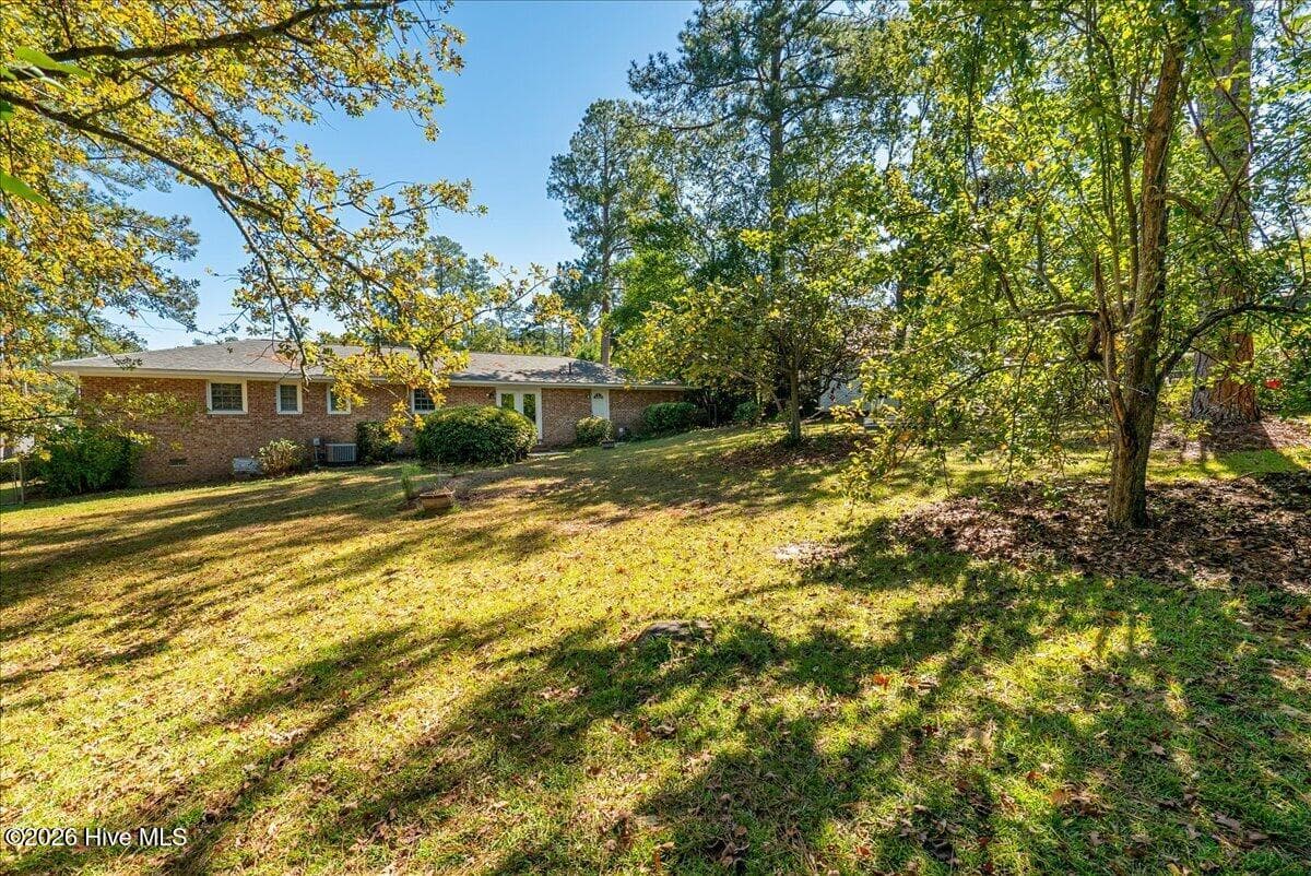 Large yard with fig tree in middle - 1912 Coulter Drive, North Augusta, SC 29841