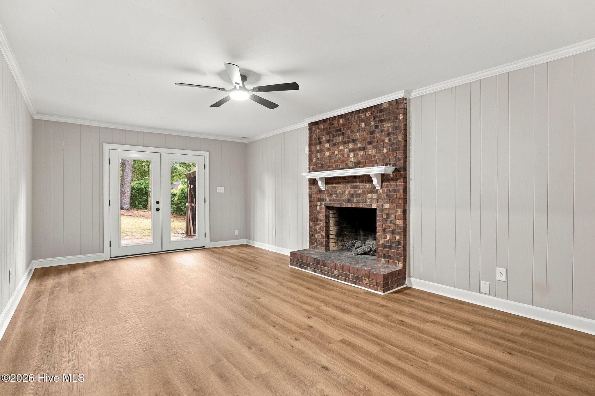 Basement Den with French Doors to the outdoor patio. - 2214 Somerset Drive N, Wilson, NC 27893