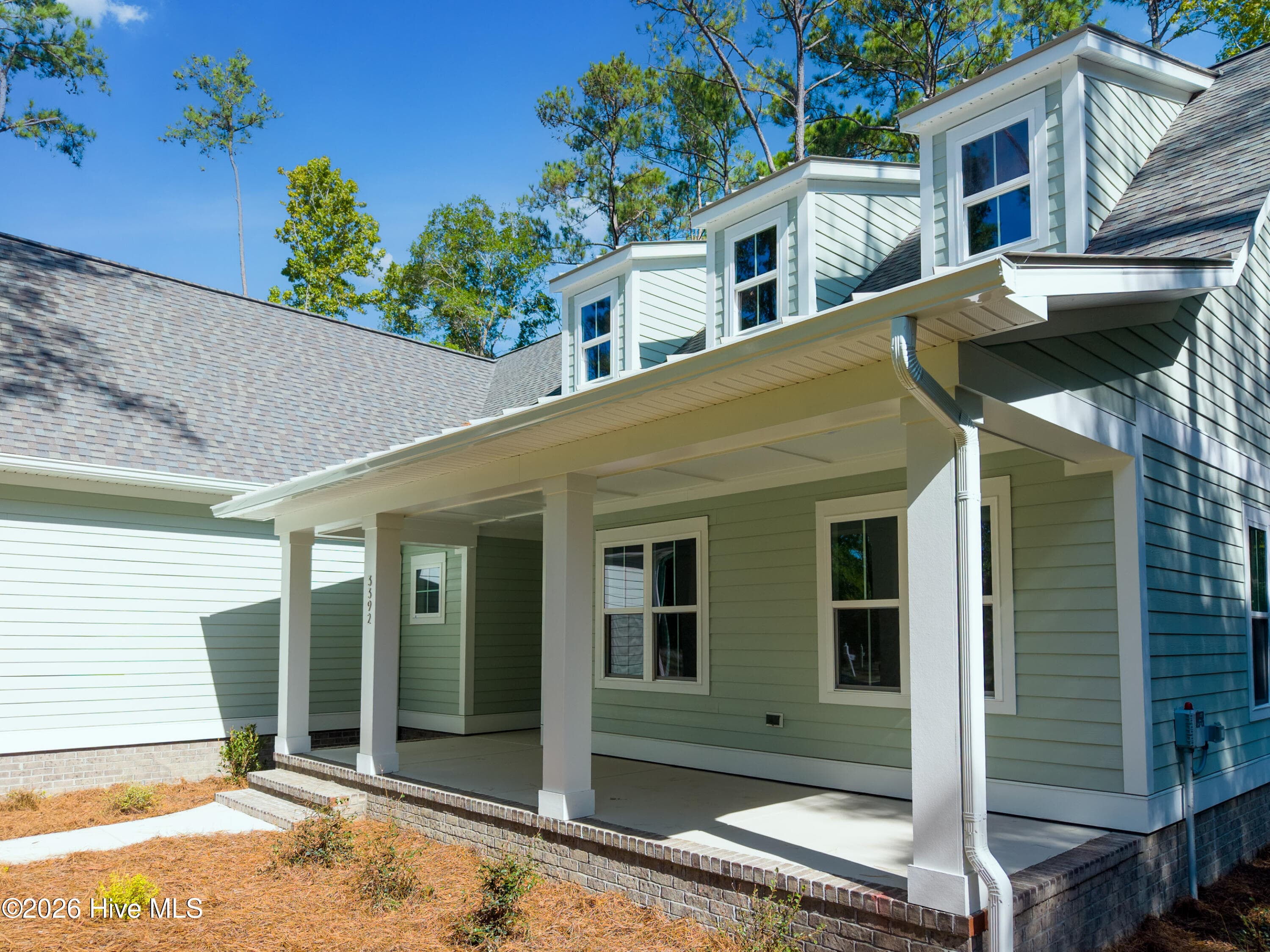 3 decorate shed dormers give the home great character - 3392 Eagle Crest Drive SW, Supply, NC 28462
