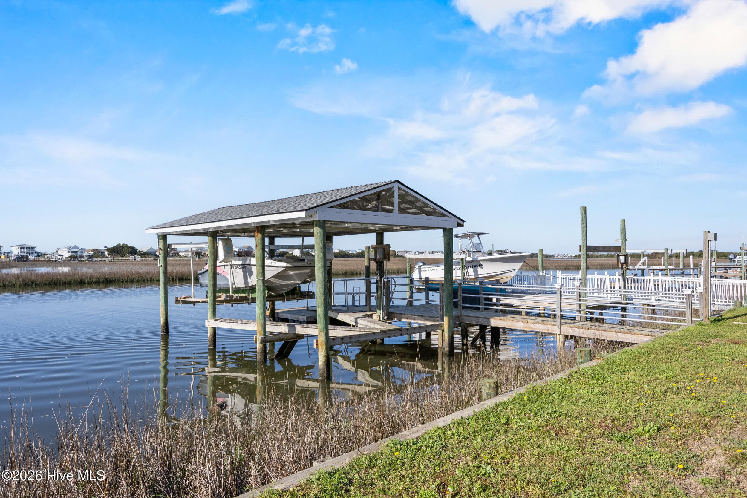 Single Family Residence at 103 E Island Drive, Oak Island, NC 28465, photo 69 of 118