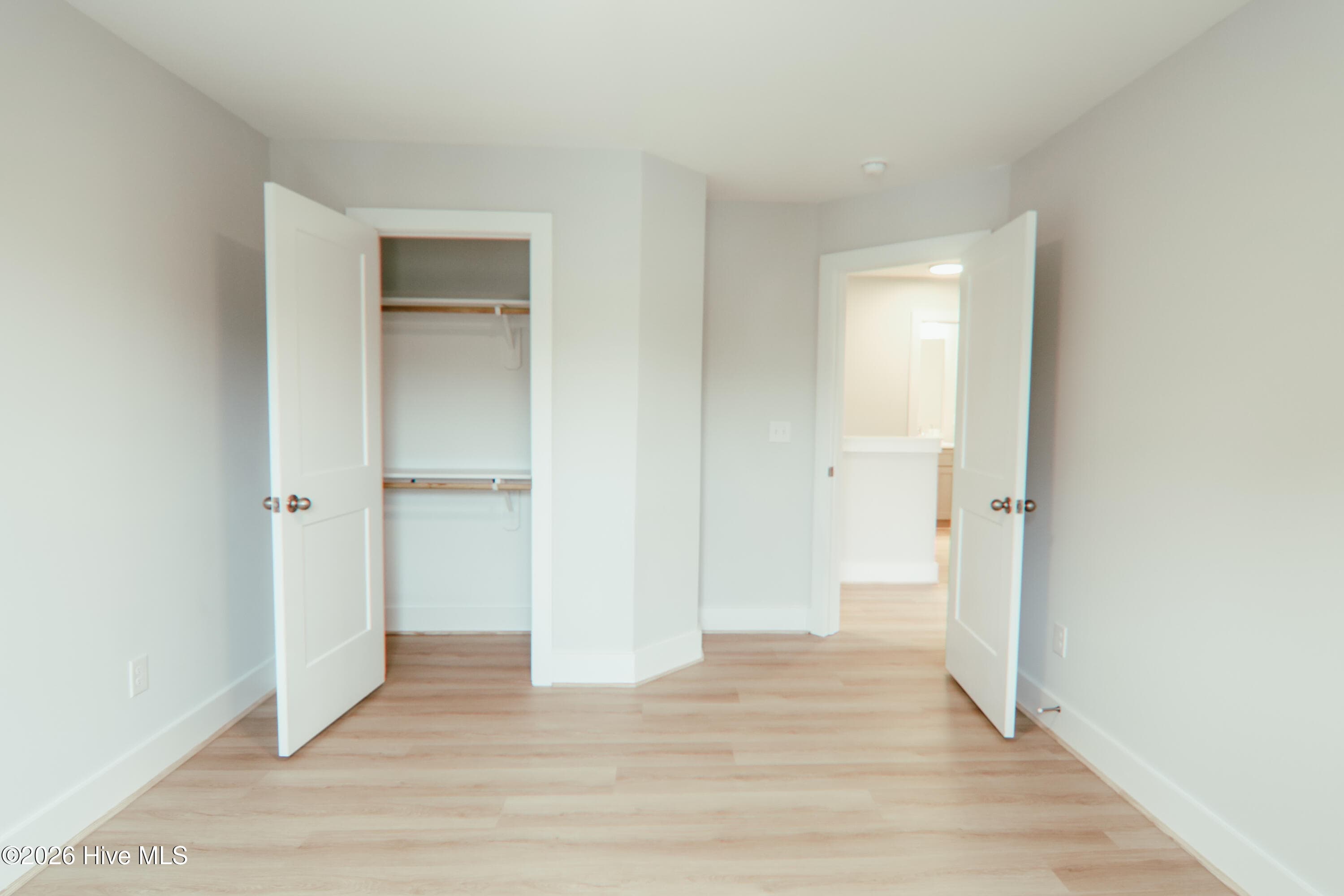 Bedroom 2 with custom shelving closet - 223 Glenwood Trail, Goldsboro, NC 27534
