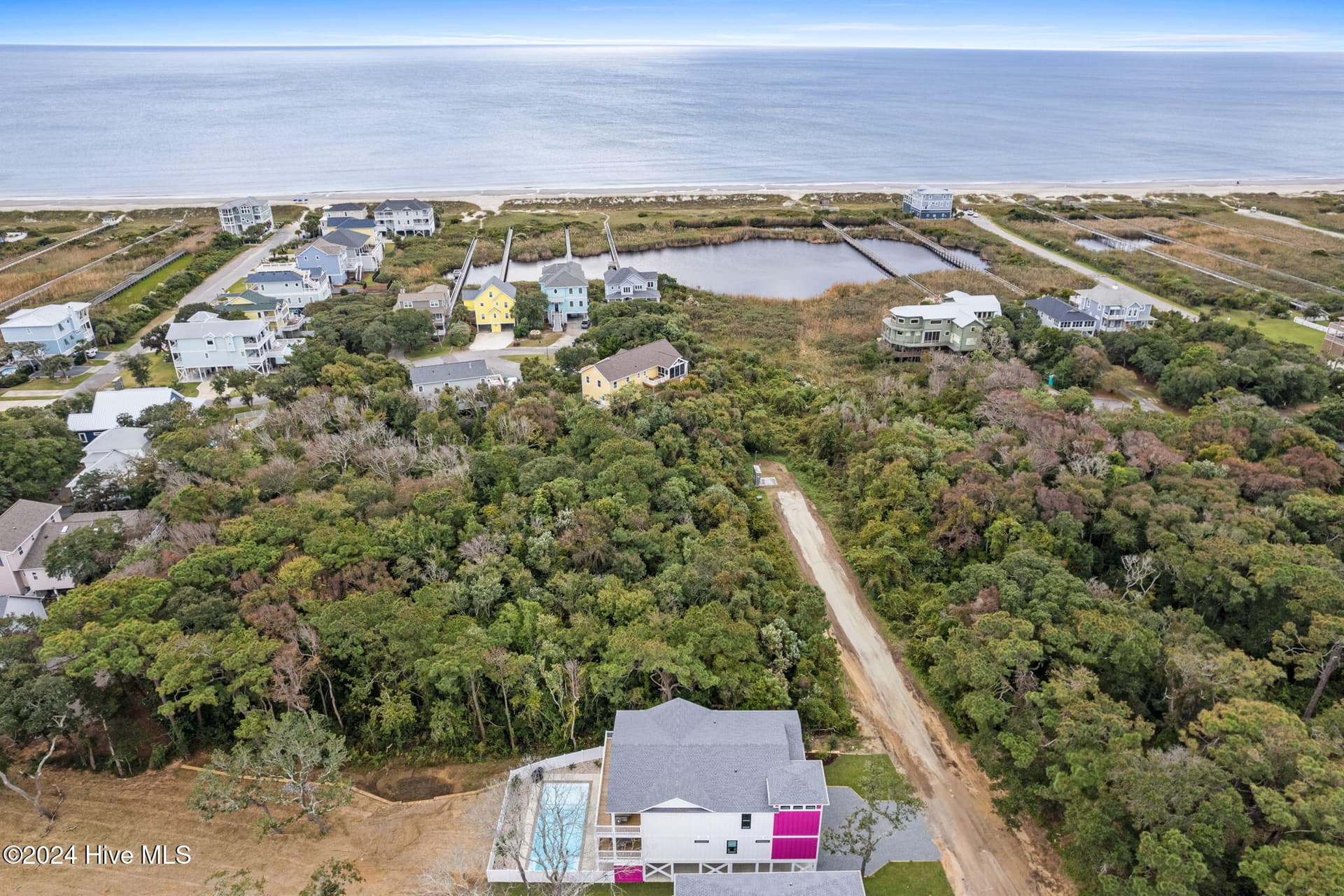 Single Family Residence at 100 SE 66th Street, Oak Island, NC 28465, photo 42 of 50