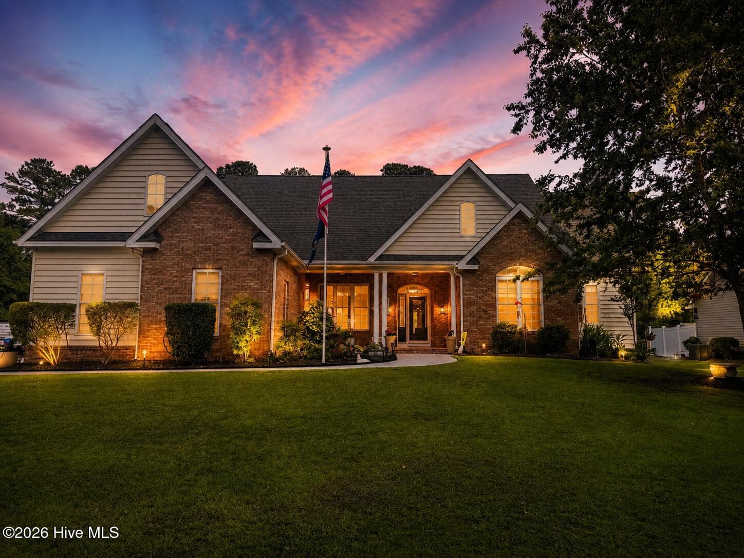 Twilight shot of front elevation - 1926 Snowy Egret Drive, Morehead City, NC 28557