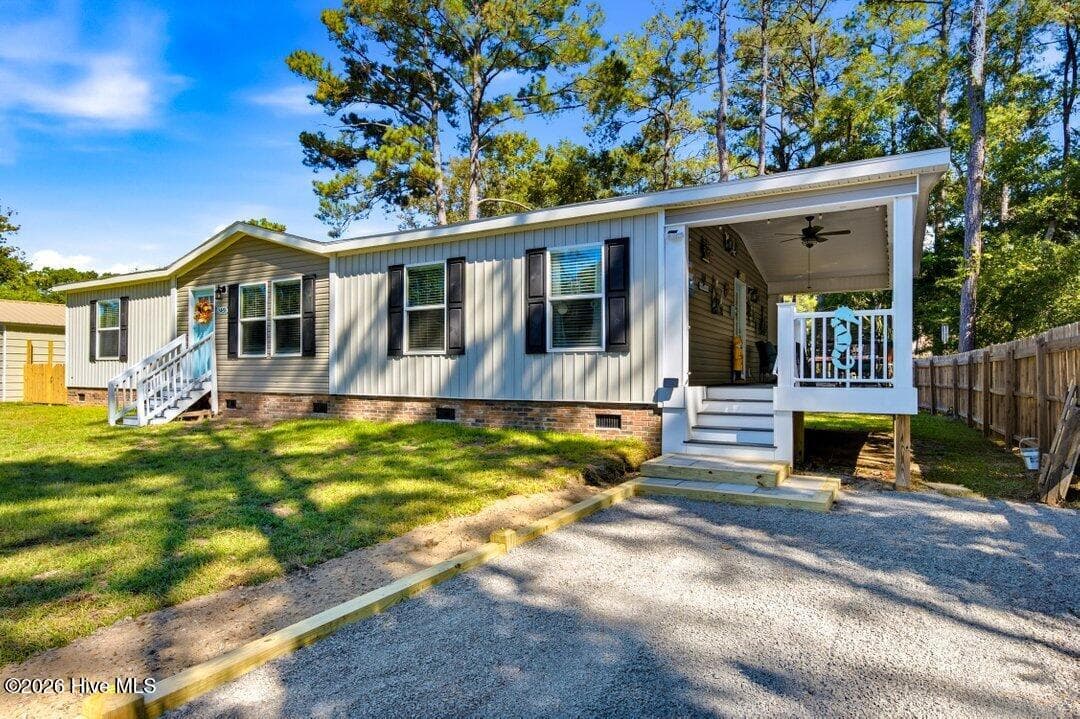 Manufactured Home at 3459 Lakeview Drive SW, Supply, NC 28462, photo 2 of 70