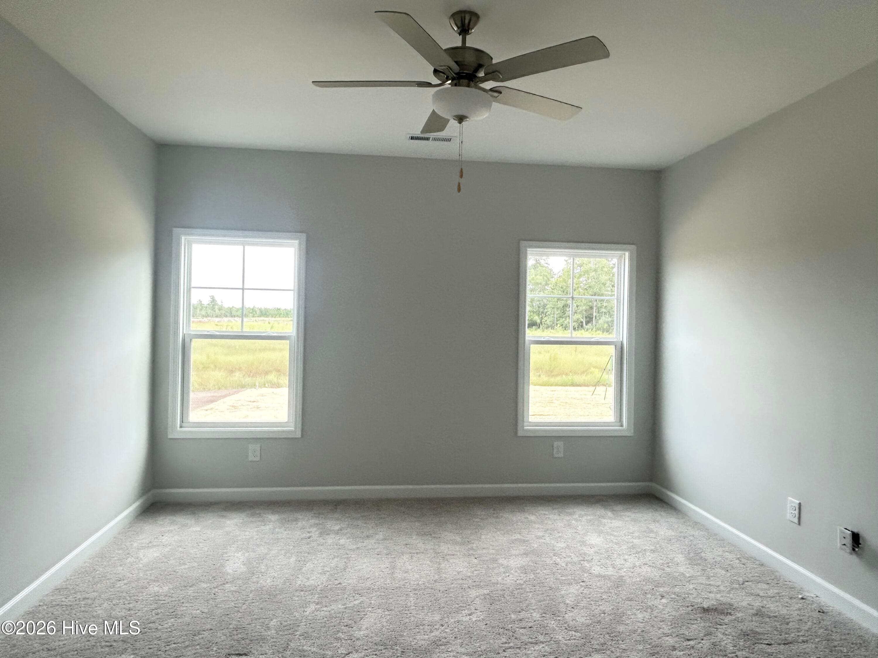 Primary suite features a Private Bathroom with Tile Shower and Large Walk-in Closet - 4212 Workman Loop 95, Leland, NC 28451