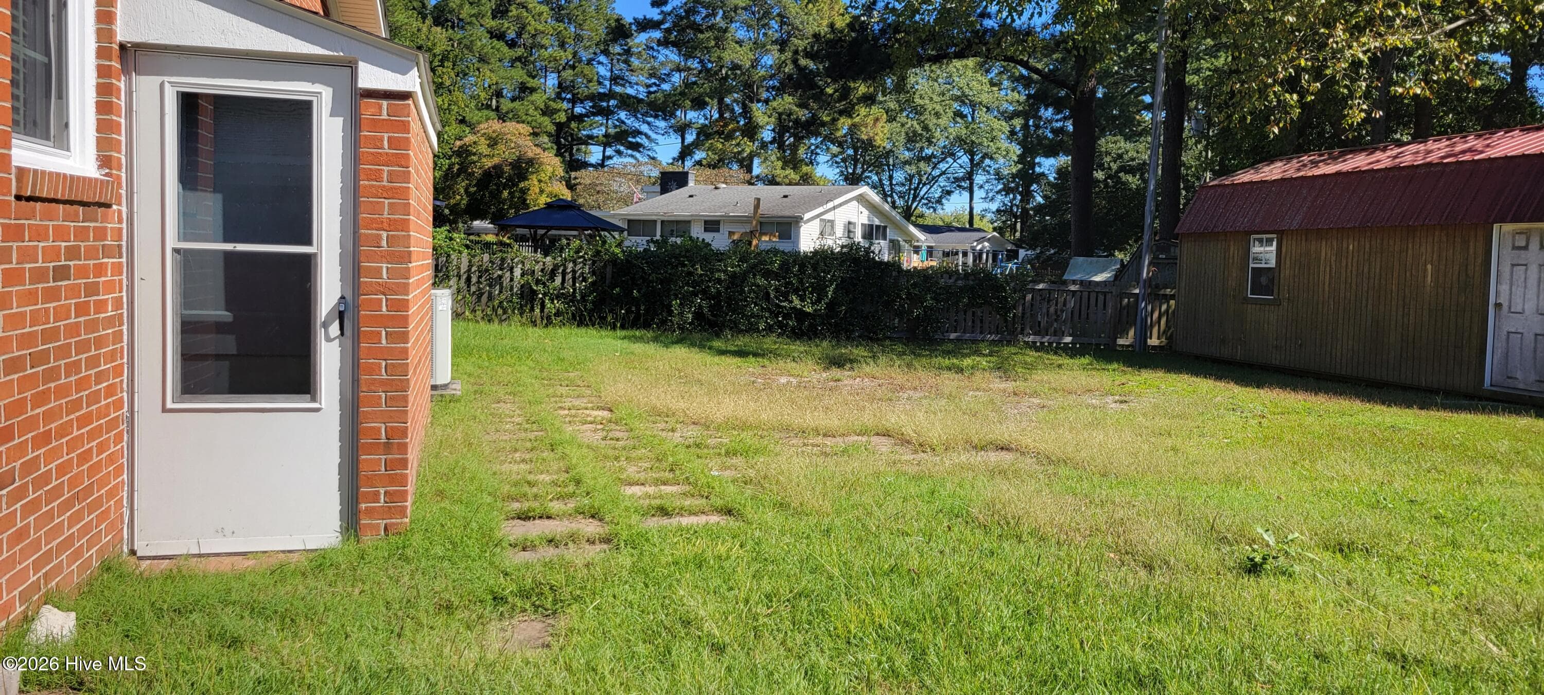 backyard and exterior entrance to basement - 110 Landon Drive, Washington, NC 27889