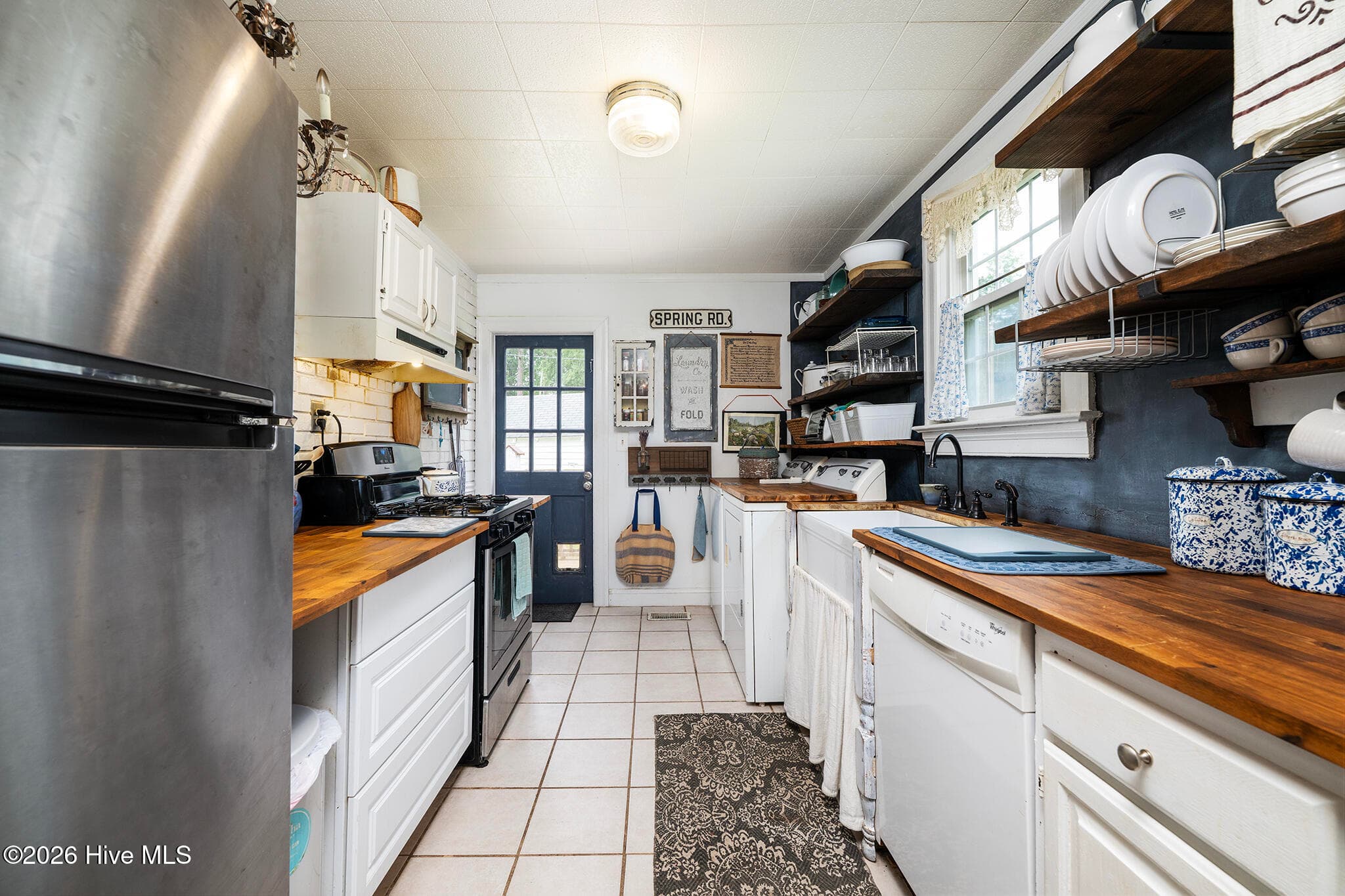 Kitchen with Butcher Block Countertops and Open Shelving - 1902 Wilson Street, New Bern, NC 28560