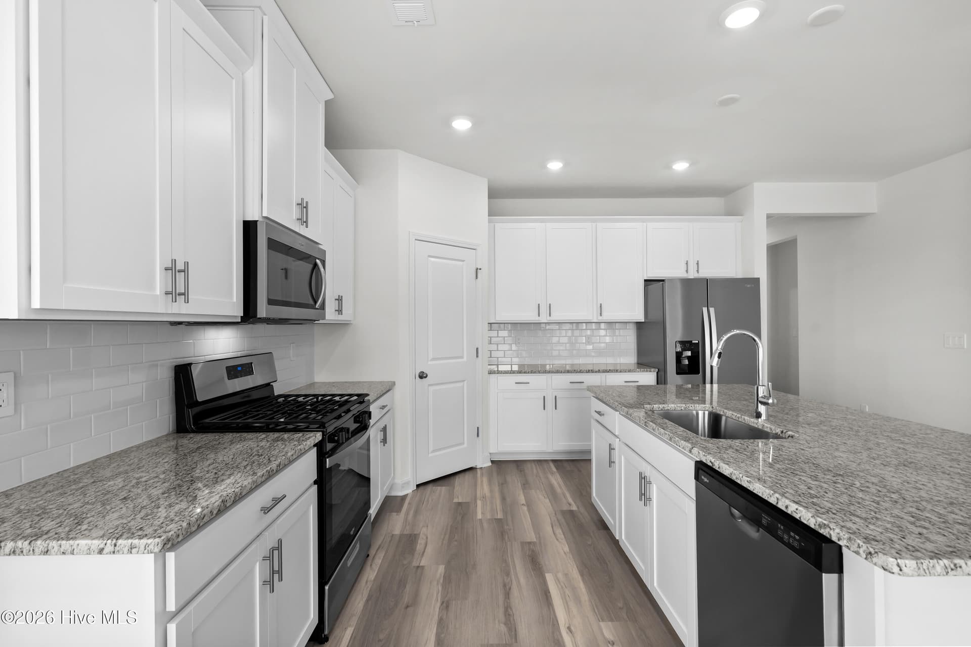 Photo is not of the actual home, but is an example photo of a completed home and may depict options and/or features that are not included - 4154 Generations Circle NW, Ash, NC 28420