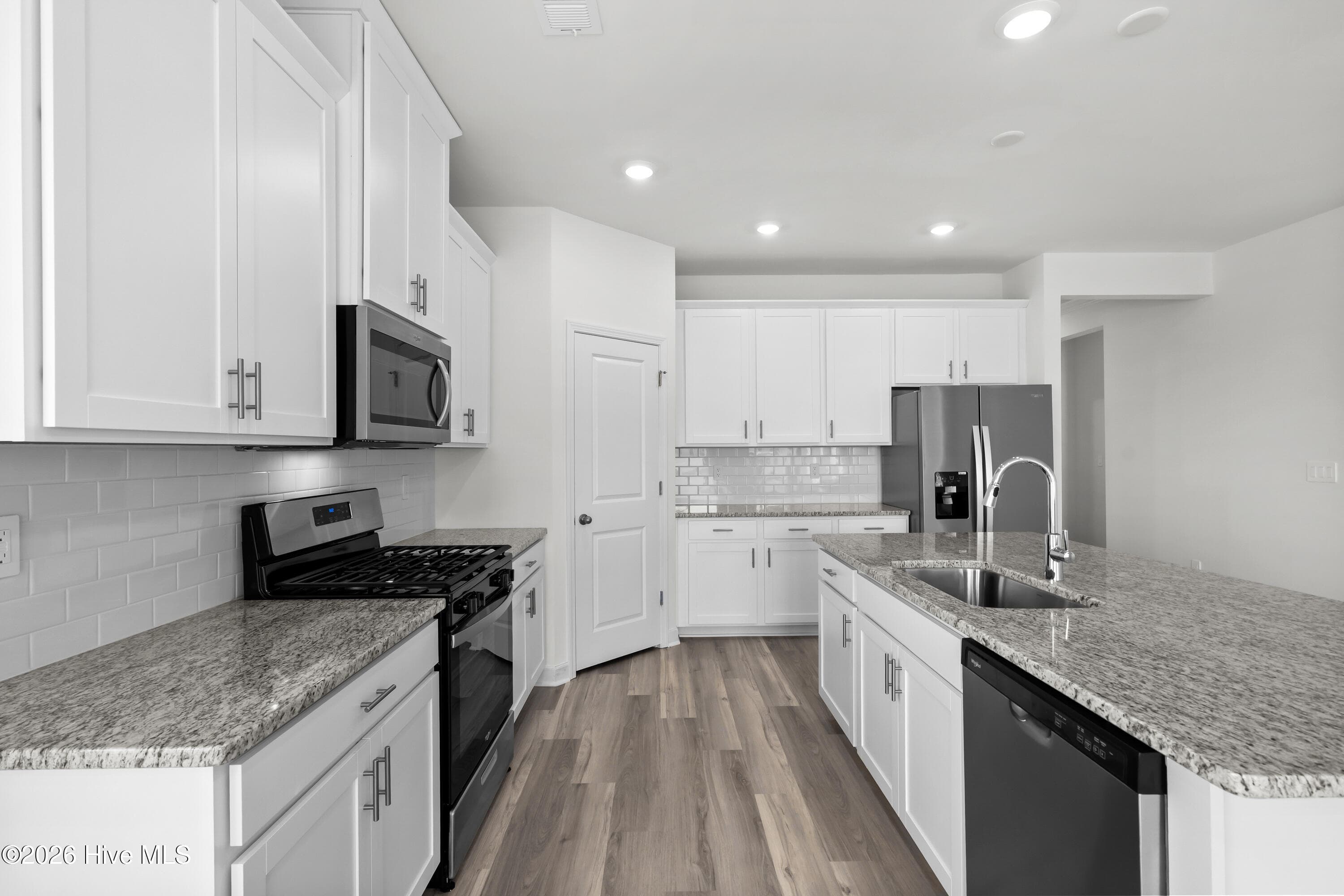 Photo is not of the actual home, but is an example photo of a completed home and may depict options and/or features that are not included - 4154 Generations Circle NW, Ash, NC 28420