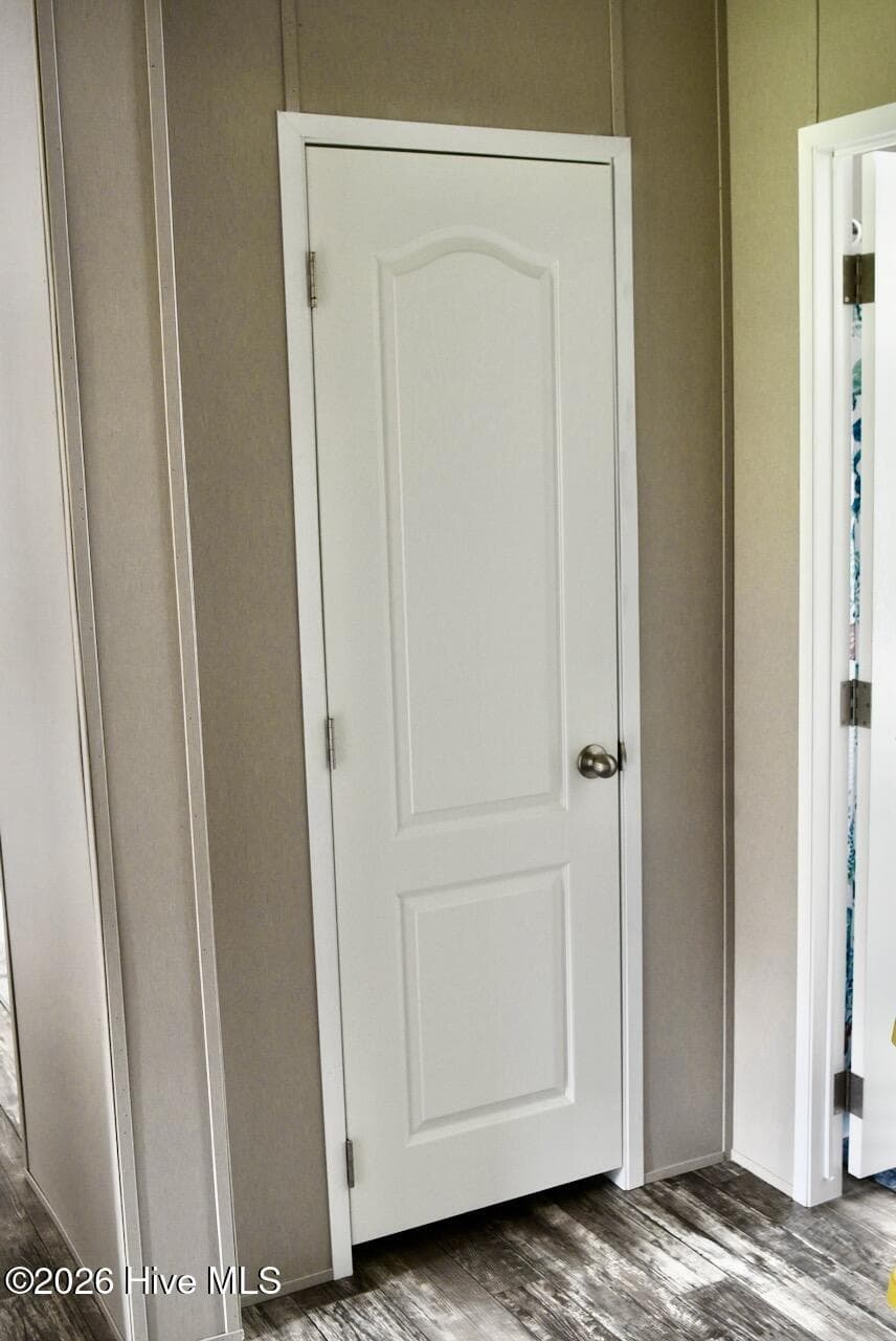 The linen closet is in the hall wall between bathroom #2 and the 2 additional bedrooms. - 1430 Nixonton Road, Elizabeth City, NC 27909