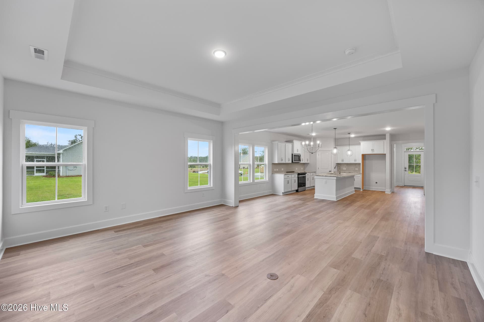 Home shown is a representation of the floor plan and may include optional features or upgrades. Elevations, materials, colors, finishes, square footage, and included features may vary from the actual home. Please consult a Sales Representative for complete details. - 4491 Village Green Drive SW Homesite 93, Shallotte, NC 28470