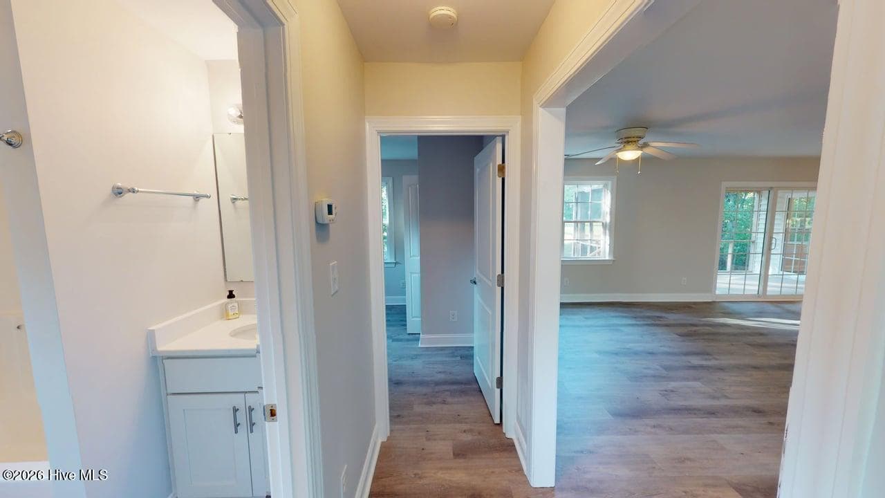 The hallway that connects the full bathroom and Bedrooms 2 and 3! - 1114 Barkentine Drive, New Bern, NC 28560