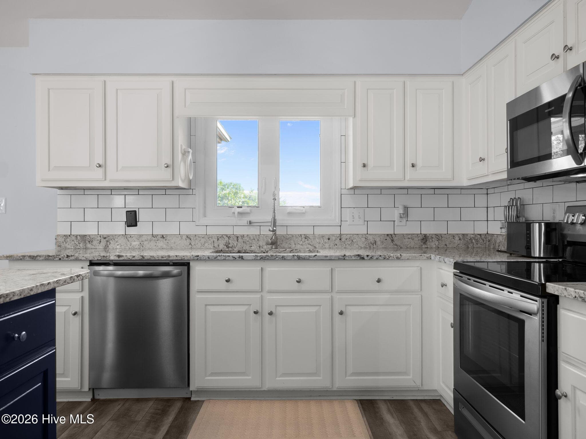 Granite Topped Kitchen w/Tile Backsplash - 5415 Cedar Tree Lane, Emerald Isle, NC 28594