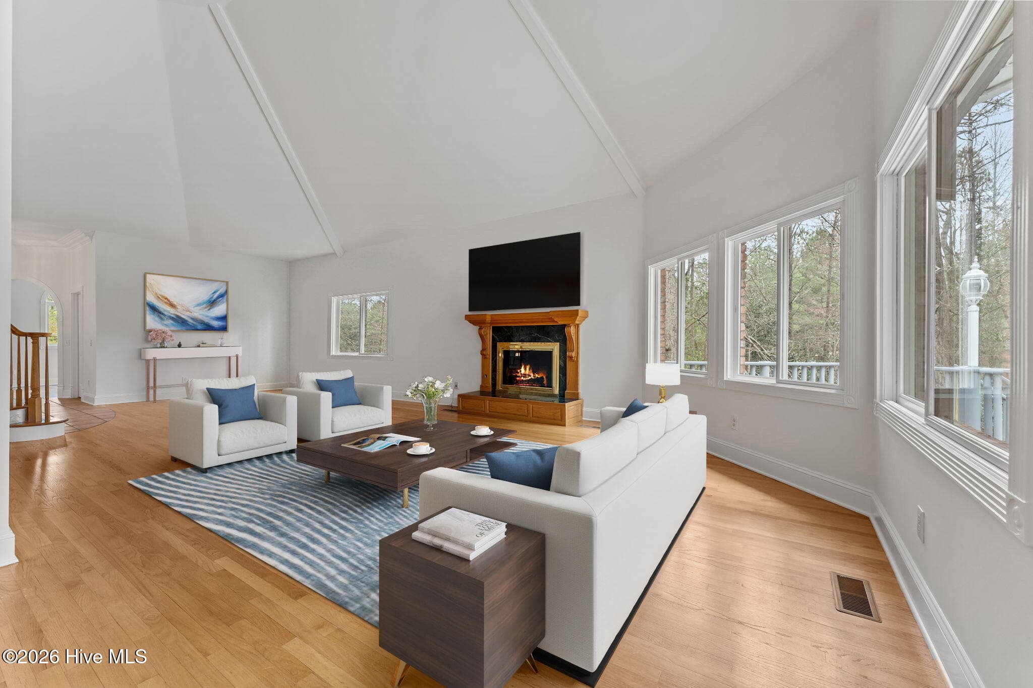 Virtual staging of the family living area. - 22 Lochmere Drive, Pinehurst, NC 28374