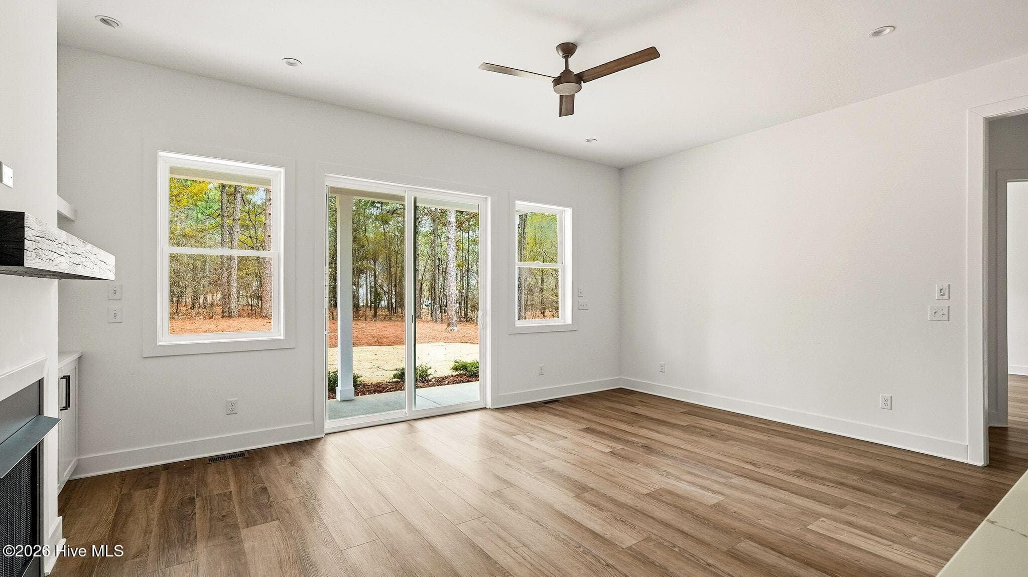 Sliders leading to the large backyard - 139 Lancashire Lane, Seven Lakes, NC 27376