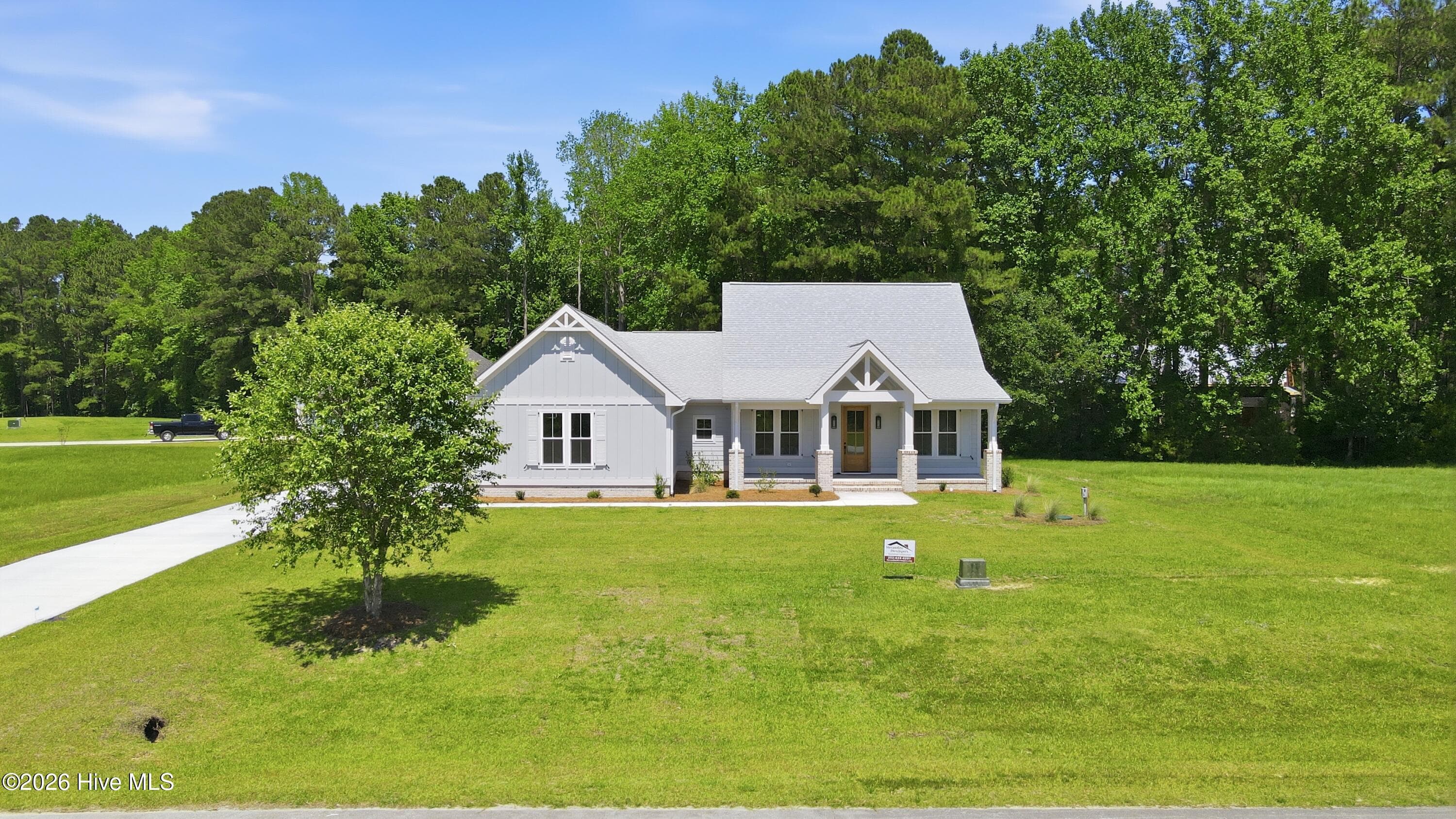 Single Family Residence at 128 W Burton Farm Drive, Minnesott Beach, NC 28510, photo 2 of 133