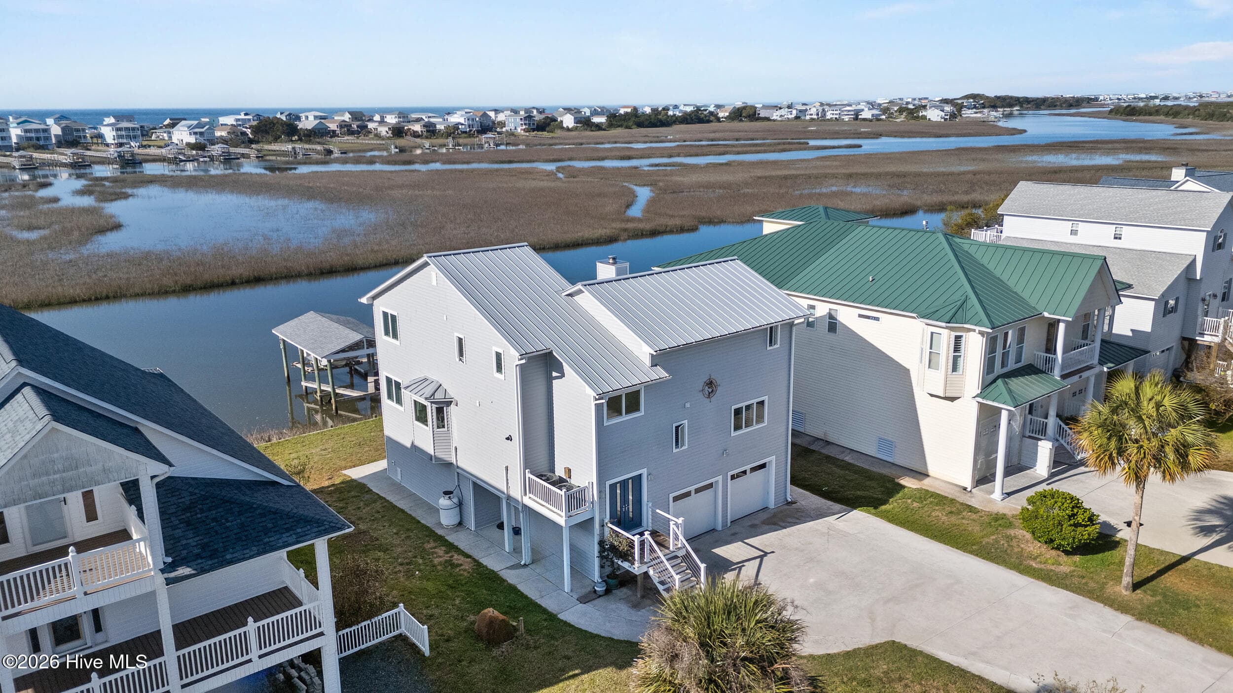 Single Family Residence at 103 E Island Drive, Oak Island, NC 28465, photo 71 of 118