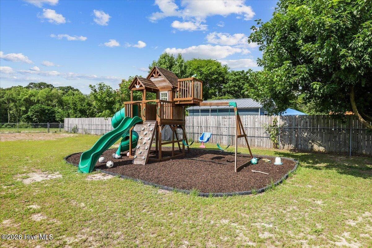 Playground with rubber mulch - 105 Pointe Drive, La Grange, NC 28551