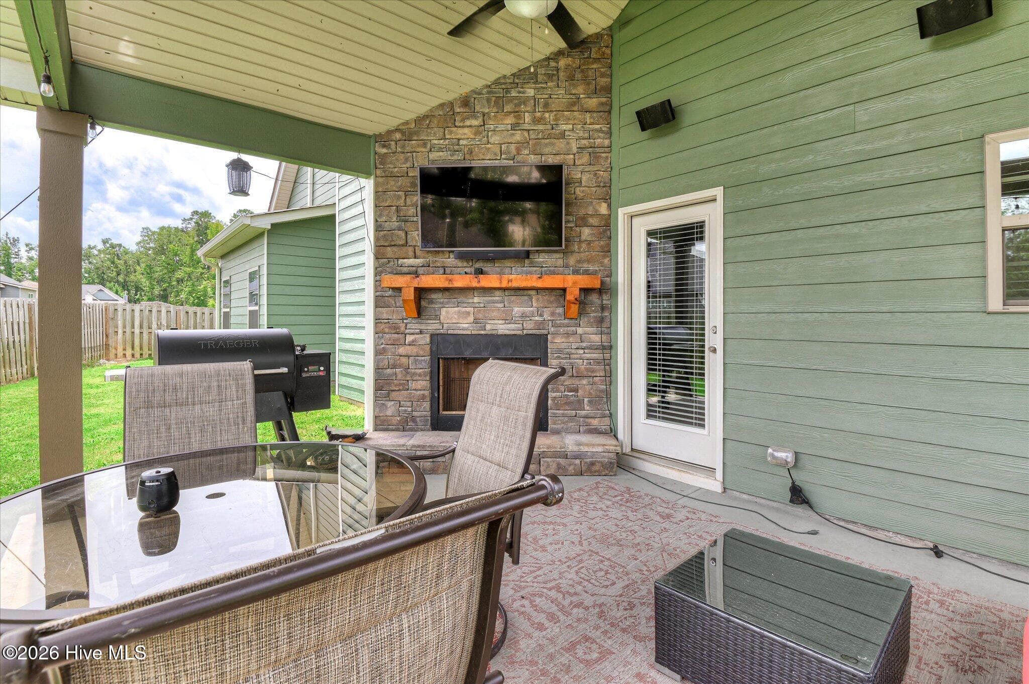 Backyard covered patio w/ wood burning fireplace - 257 Haverford Drive, Grovetown, GA 30813