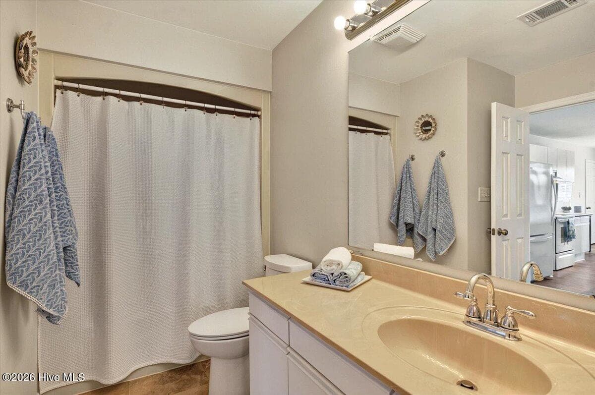 Shared guest and bedroom frull bath - 816 Colony Place SW # D, Sunset Beach, NC 28468