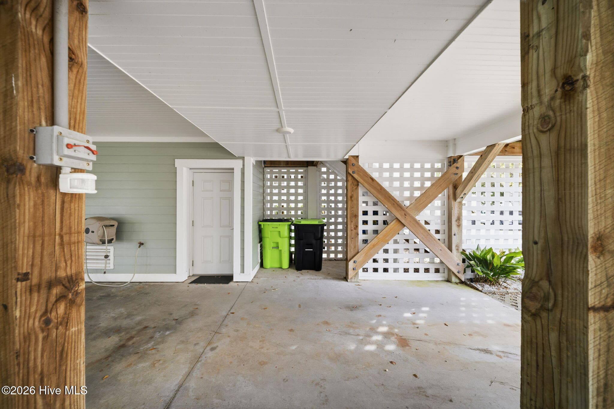 ground level entry to elevator - 204 N Boca Bay Lane B, Surf City, NC 28445