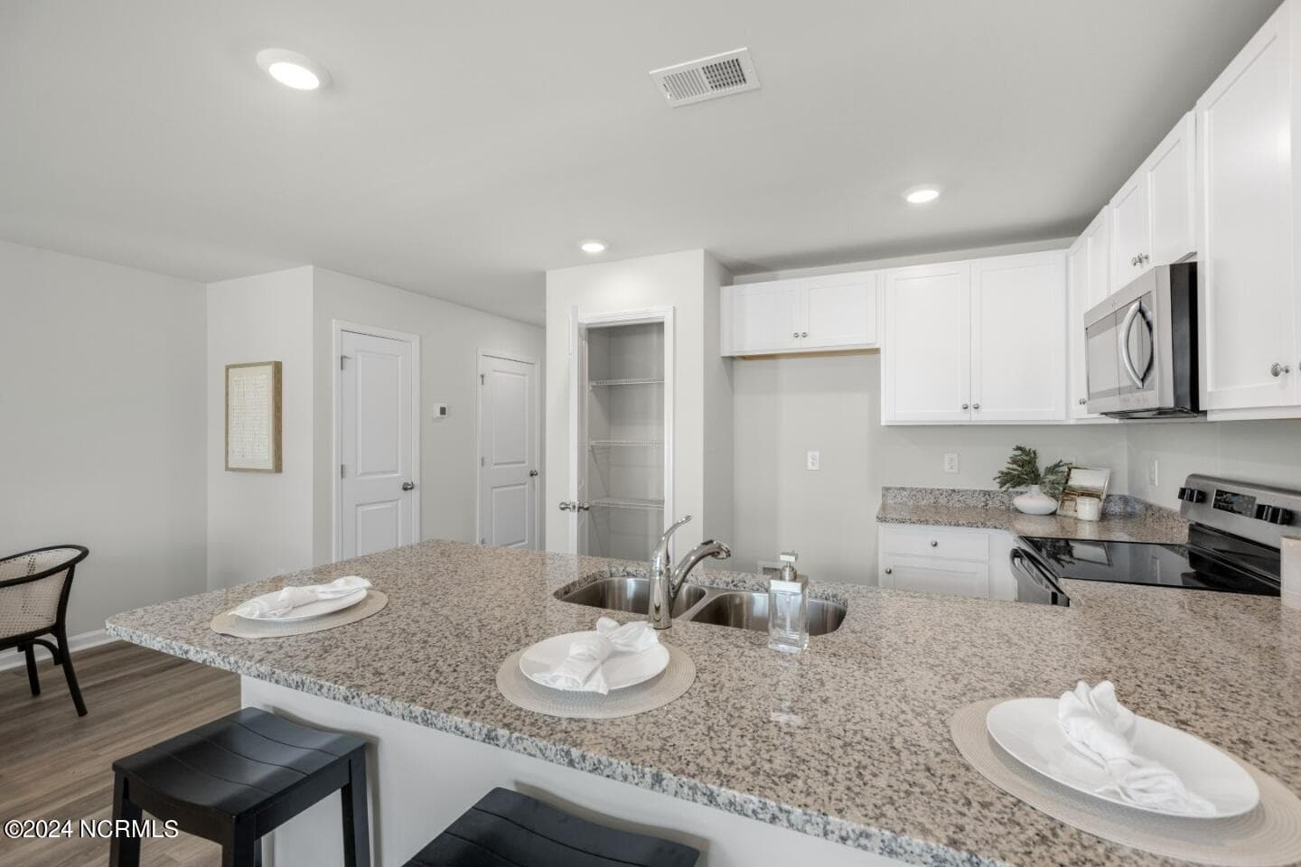 Image is similar to actual home. Colors/finishes may vary - 8189 Foxglove Lane Unit 90, Leland, NC 28451