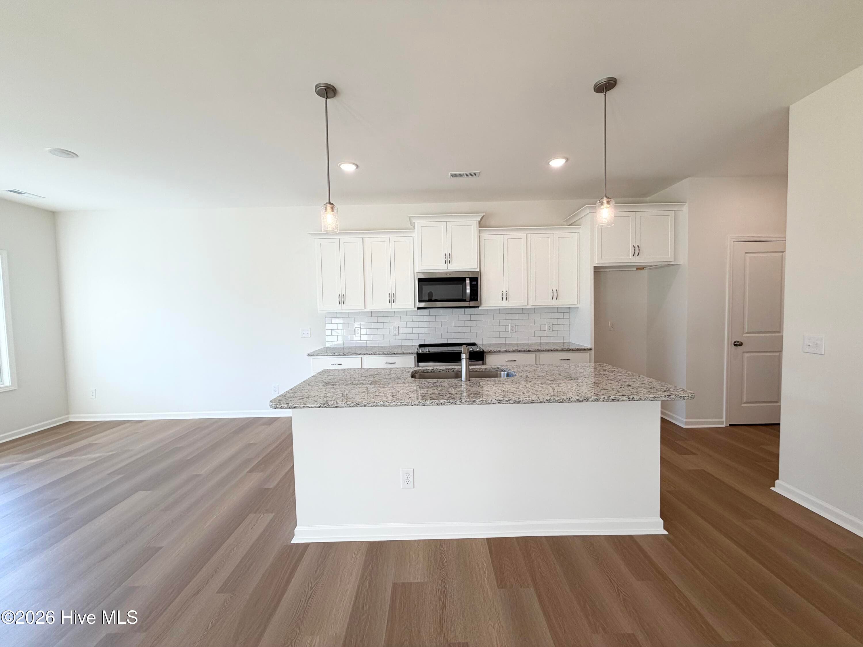 Home shown is a representation of the floor plan and may include optional features or upgrades. Elevations, materials, colors, - 758 Pelican Cv Way SE 298, Southport, NC 28461