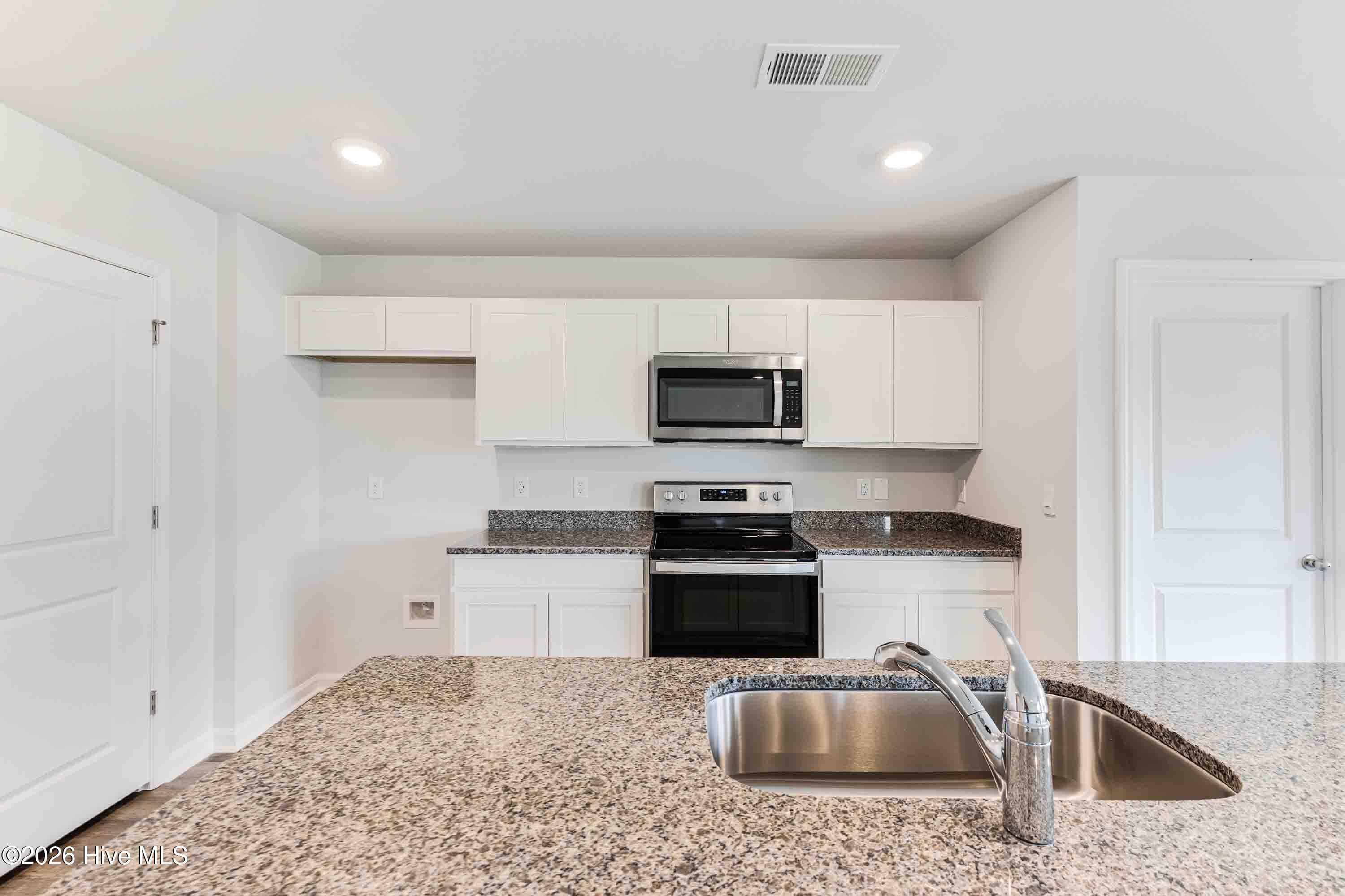 Photos are of a similar, completed home. Actual colors may vary - 3085 Golden Field Drive SE Lot 78, Bolivia, NC 28422