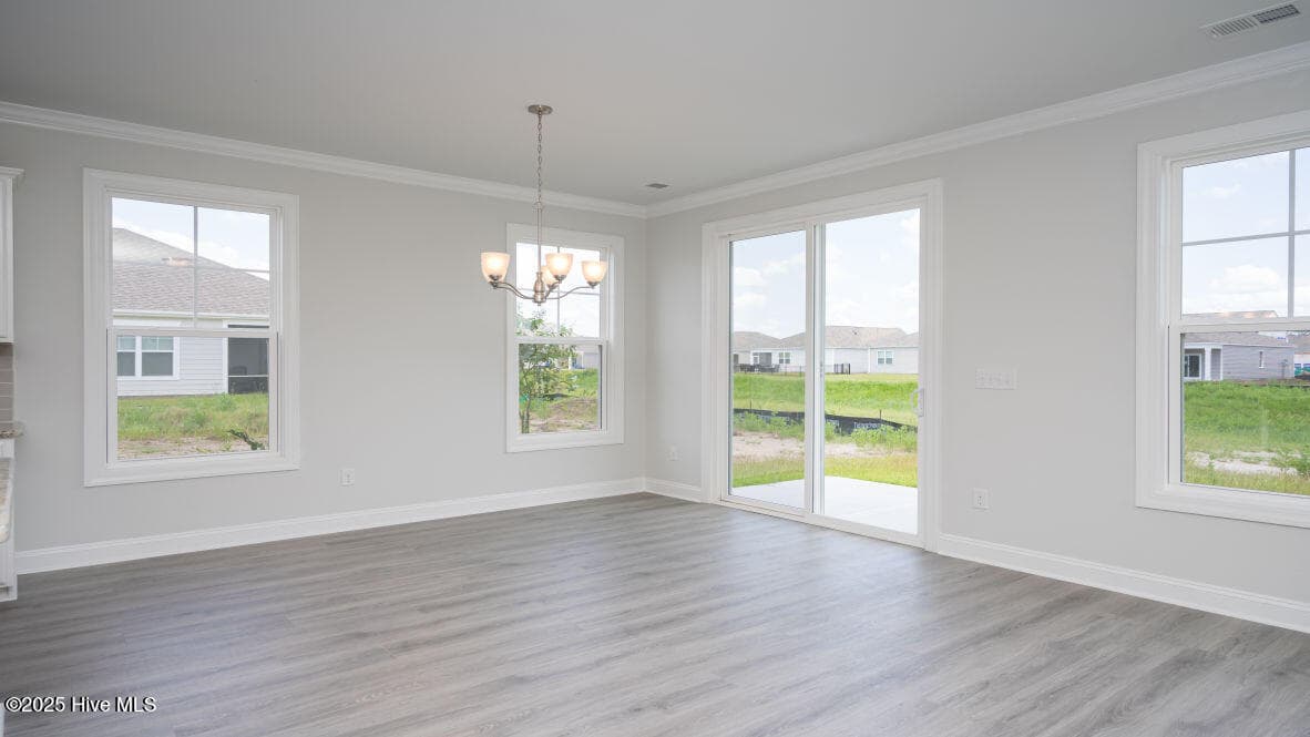 Photo is similar to actual home. Home is currently under construction. Features, colors and options may be different from those shown in representative photos. Call for detailed information. - 3221 Butterfly Ginger Street Lot 74, Leland, NC 28451