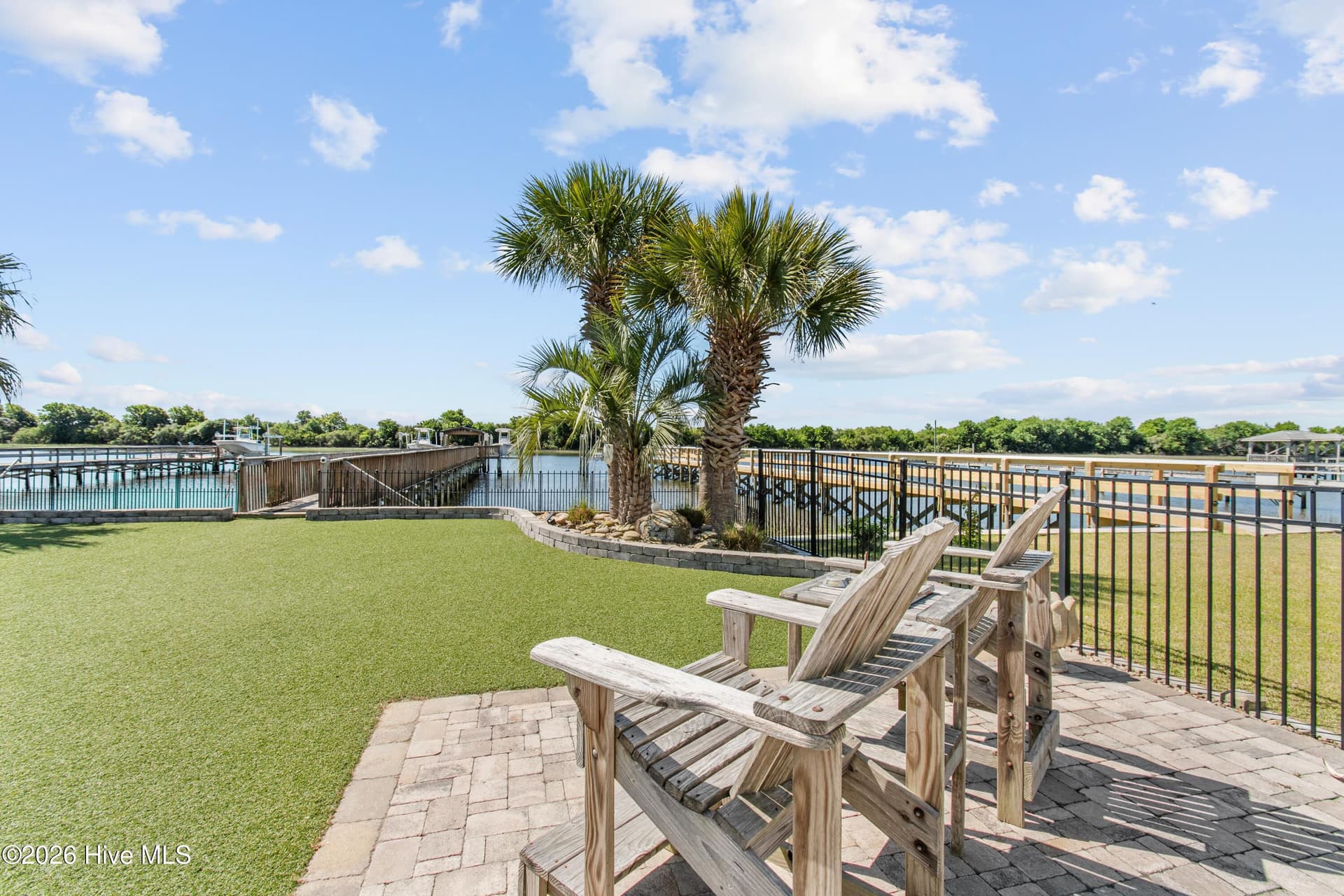 Beautiful pavers outline seating areas. - 2024 Camelot Drive SW, Ocean Isle Beach, NC 28469