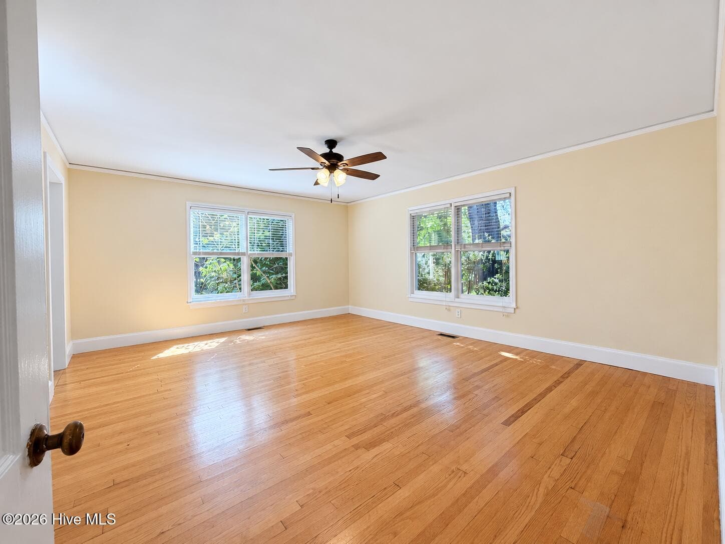 Huge primary suite with flex sunroom type space between this room and the screened porch. - 320 Northern Boulevard, Wilmington, NC 28401