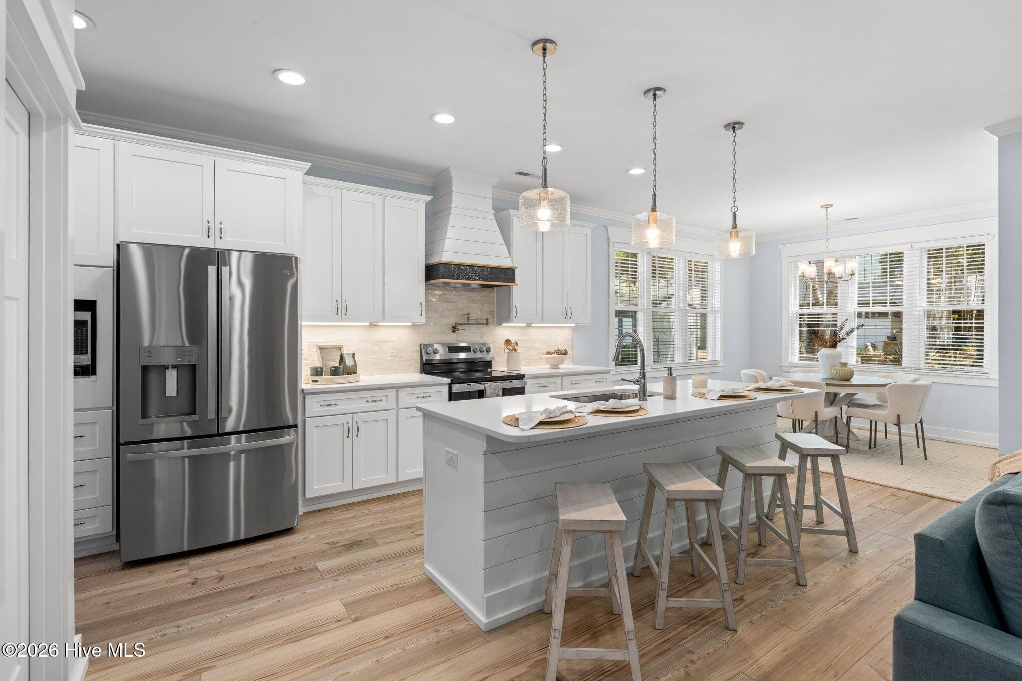 Photos of a staged model of the exact same plan - 312 NE 58th Street, Oak Island, NC 28465