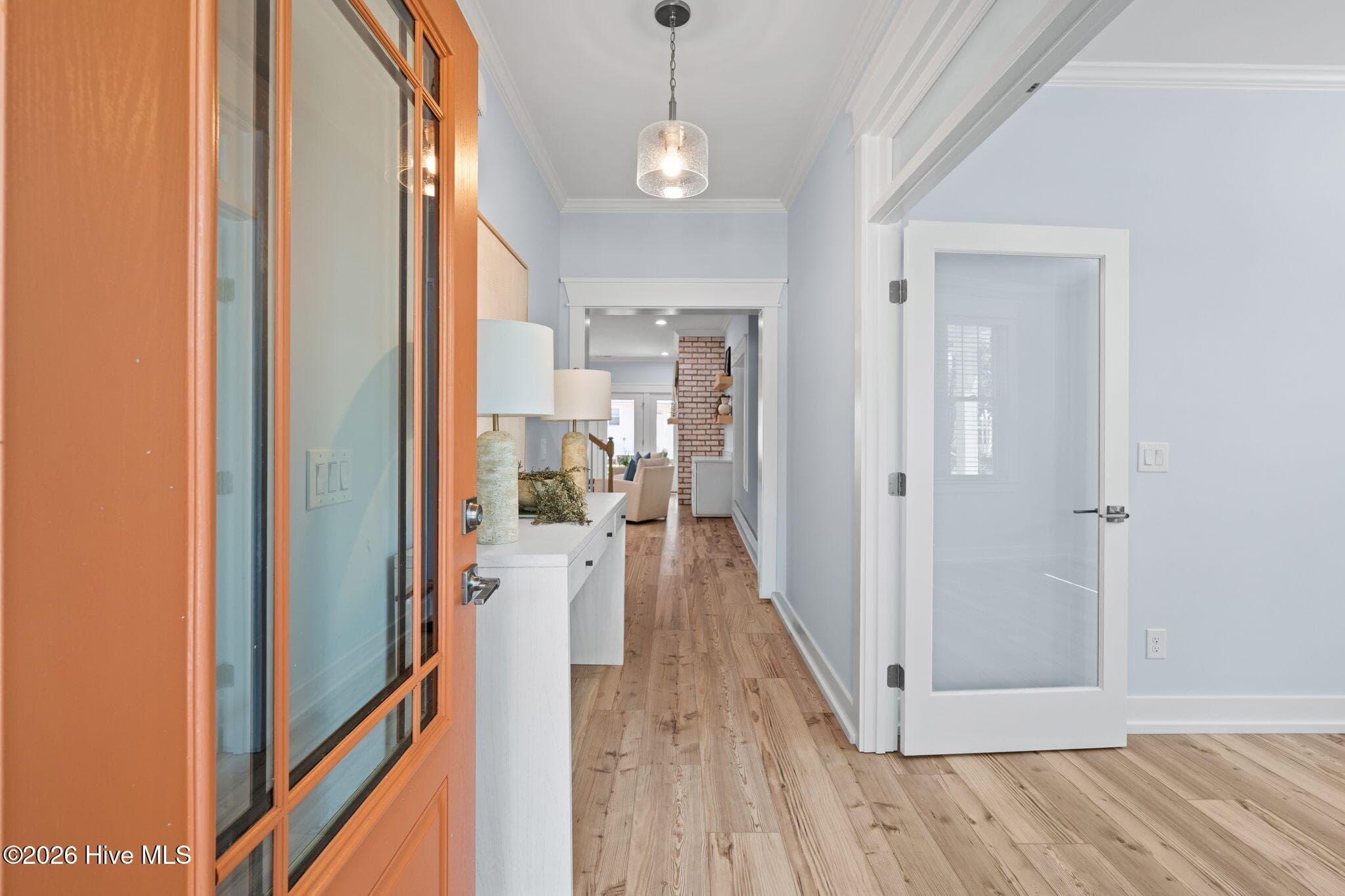 Photos of a staged model of the exact same plan - 312 NE 58th Street, Oak Island, NC 28465