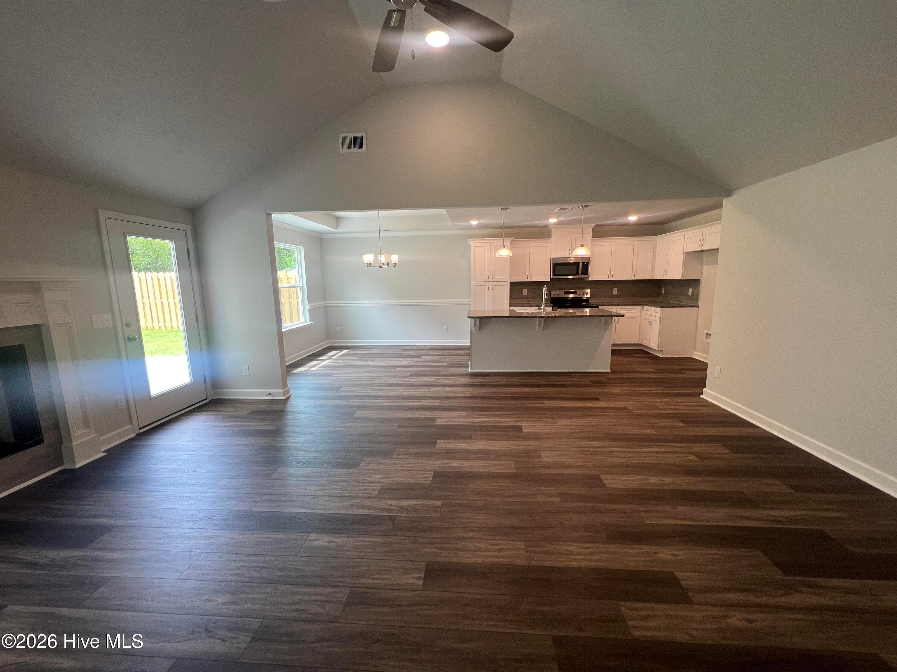 Looking into the kitchen and dining area from the great room. - 8887 Snelling Drive, Aiken, SC 29803
