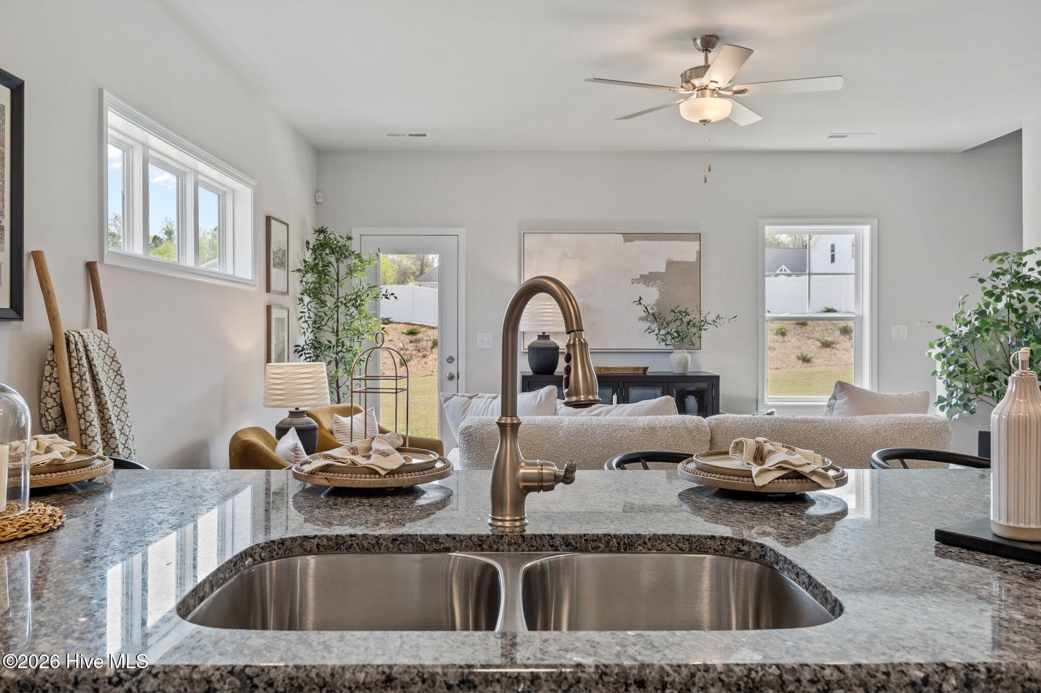 Example photo of similar home with staging. Actual home is under construction. - 4192 Workman Loop 90, Leland, NC 28451