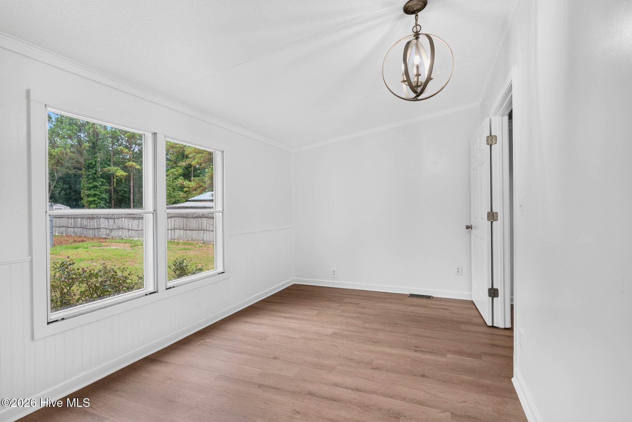 Another generously sized bedroom offers abundant natural light and flexible space to accommodate a variety of lifestyle needs. - 1199 Zack Street SE, Bolivia, NC 28422