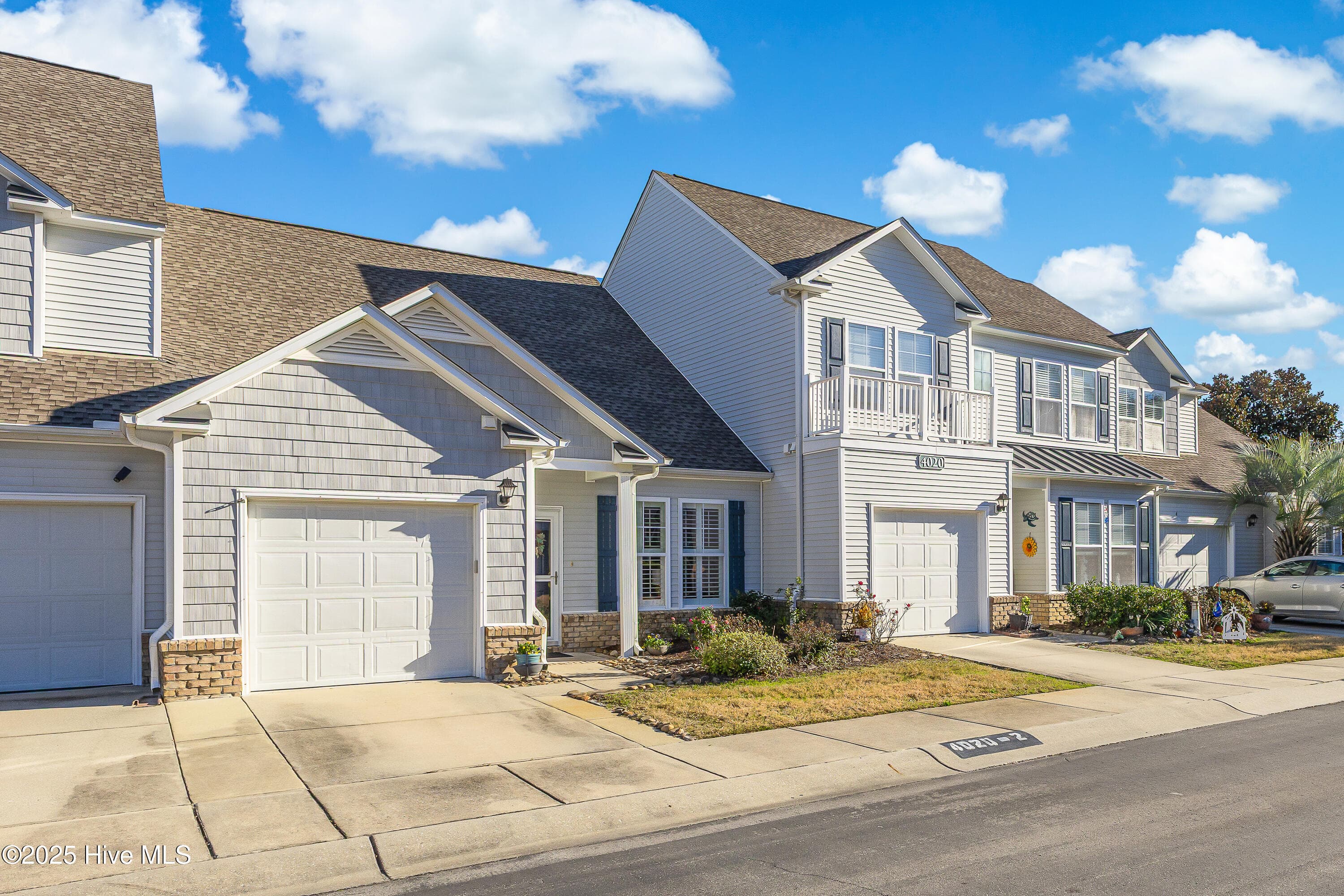A story and a half with a first floor primary and first floor half bath plus 2 more full baths! - 4020 Norseman Loop Unit 2, Southport, NC 28461