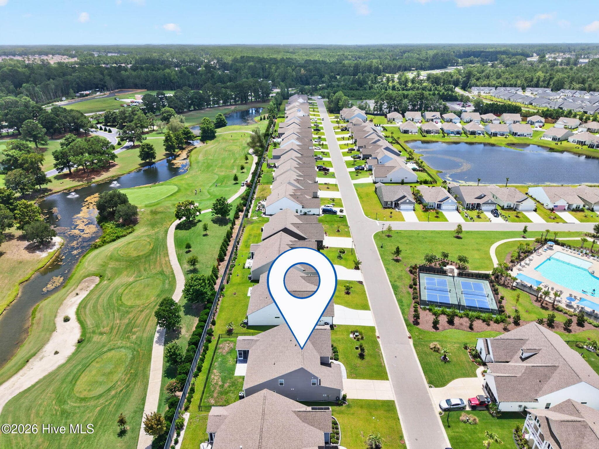An aerial view showcases the home’s golf-course location and proximity to Eagle Run’s resort-style amenities. - 139 Eagle Claw Drive, Calabash, NC 28467