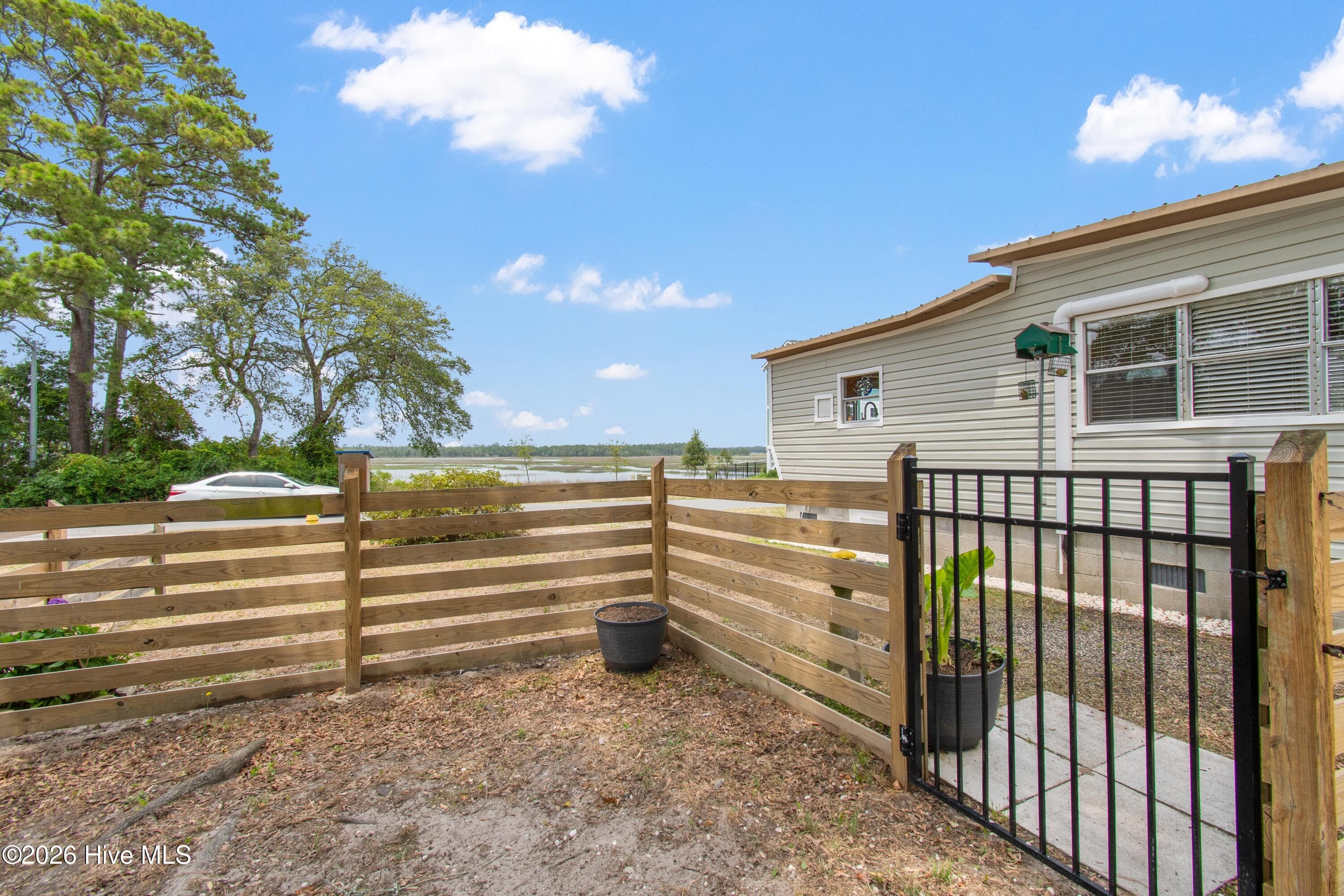 Manufactured Home at 7701 E Yacht Drive, Oak Island, NC 28465, photo 27 of 69