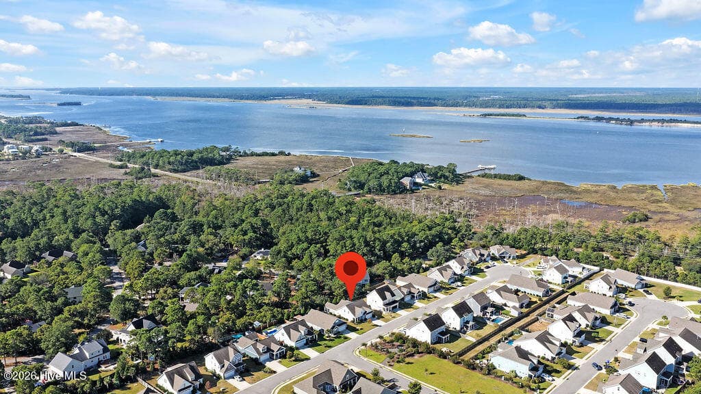 142 Rice Marsh Way - A well-appointed 3-Bed, 3-Bath 2,739 Sq Ft home with an enclosed 3-seasons room, extended patio and fully irrigated, beautifully landscaped yard. Close to the Cape Fear River, Carolina Beach, dining, shopping and entertainment, River Road Park, Veterans Park athletic complex, as well as walking and hiking trails, this home has it all! - 142 Rice Marsh Way, Wilmington, NC 28412