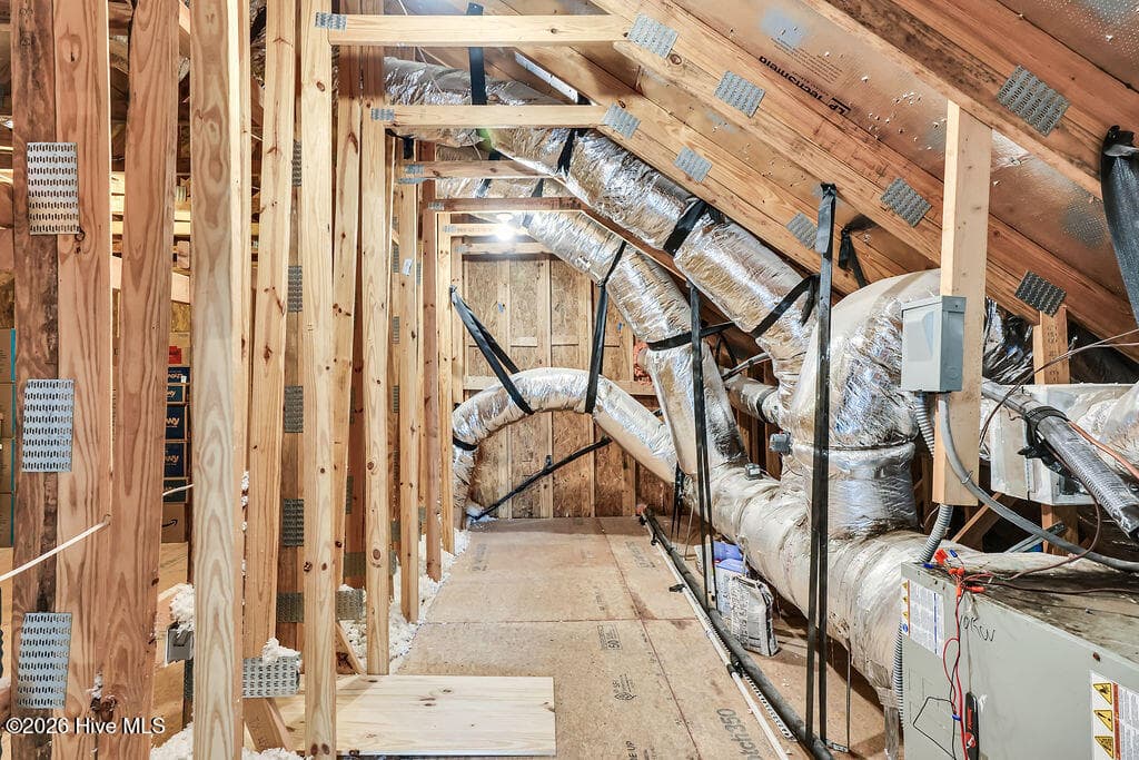 This incredible extensive, floored walk-out attic offers two large storage options! A 20X8 floored walk-out leads to a 14X13 area. Keep the storage or finish these for an added room. - 142 Rice Marsh Way, Wilmington, NC 28412