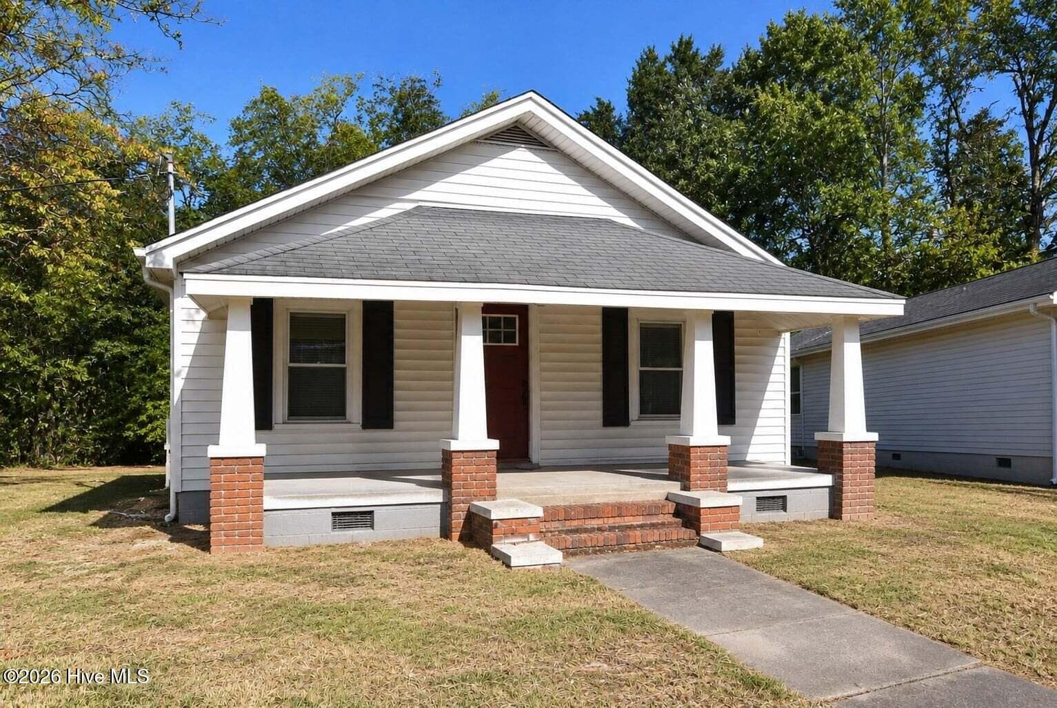 Front AI Photo w/o Bushes - 114 S Gillespie Street, Elizabethtown, NC 28337