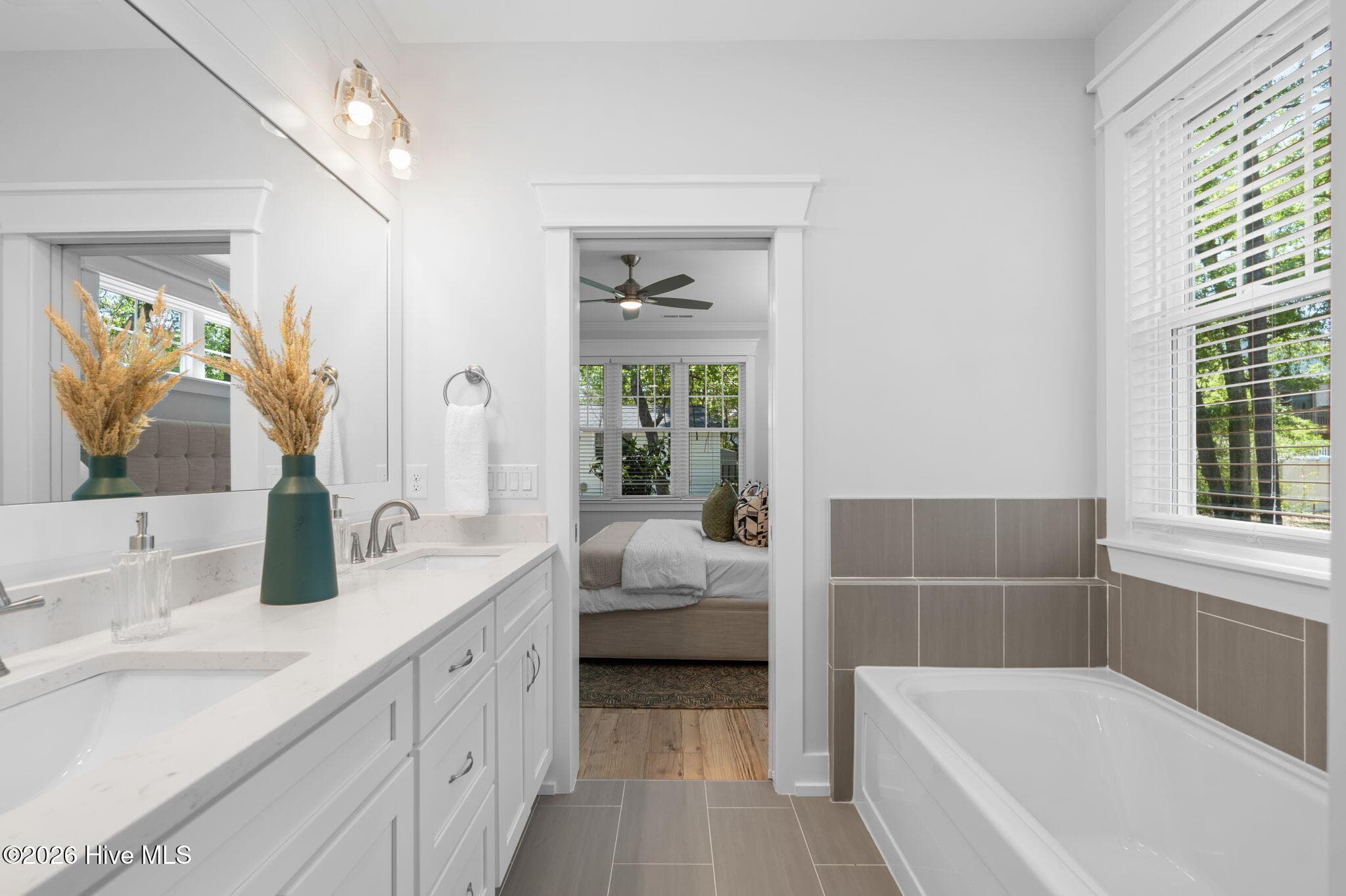 Photos of a staged model of the exact same plan - 312 NE 58th Street, Oak Island, NC 28465
