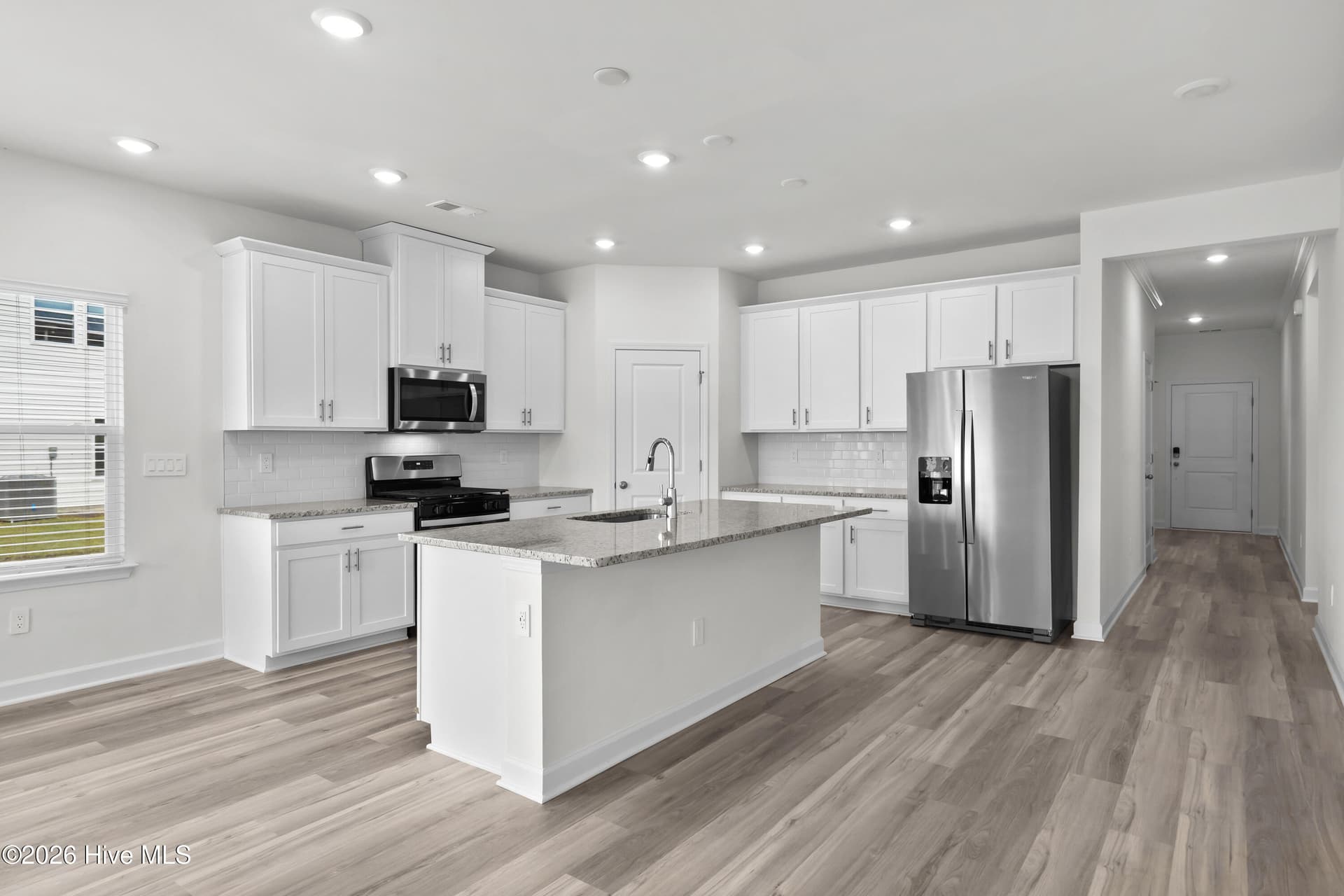 Photo is not of the actual home, but is an example photo of a completed home and may depict options and/or features that are not included - 4154 Generations Circle NW, Ash, NC 28420
